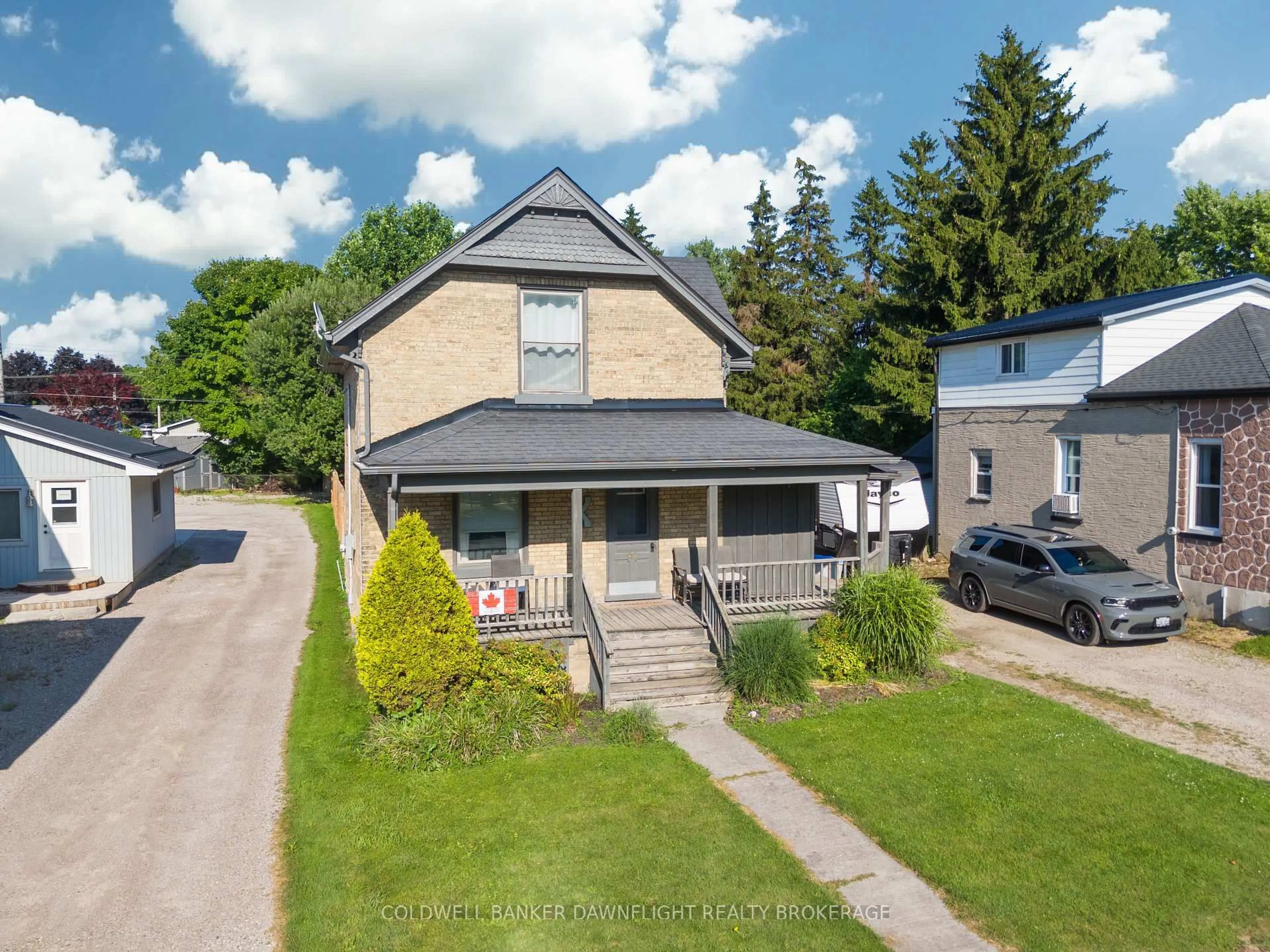 A pic from outside/outdoor area/front of a property/back of a property/a pic from drone, street for 96 Main St, South Huron Ontario N0M 1S1