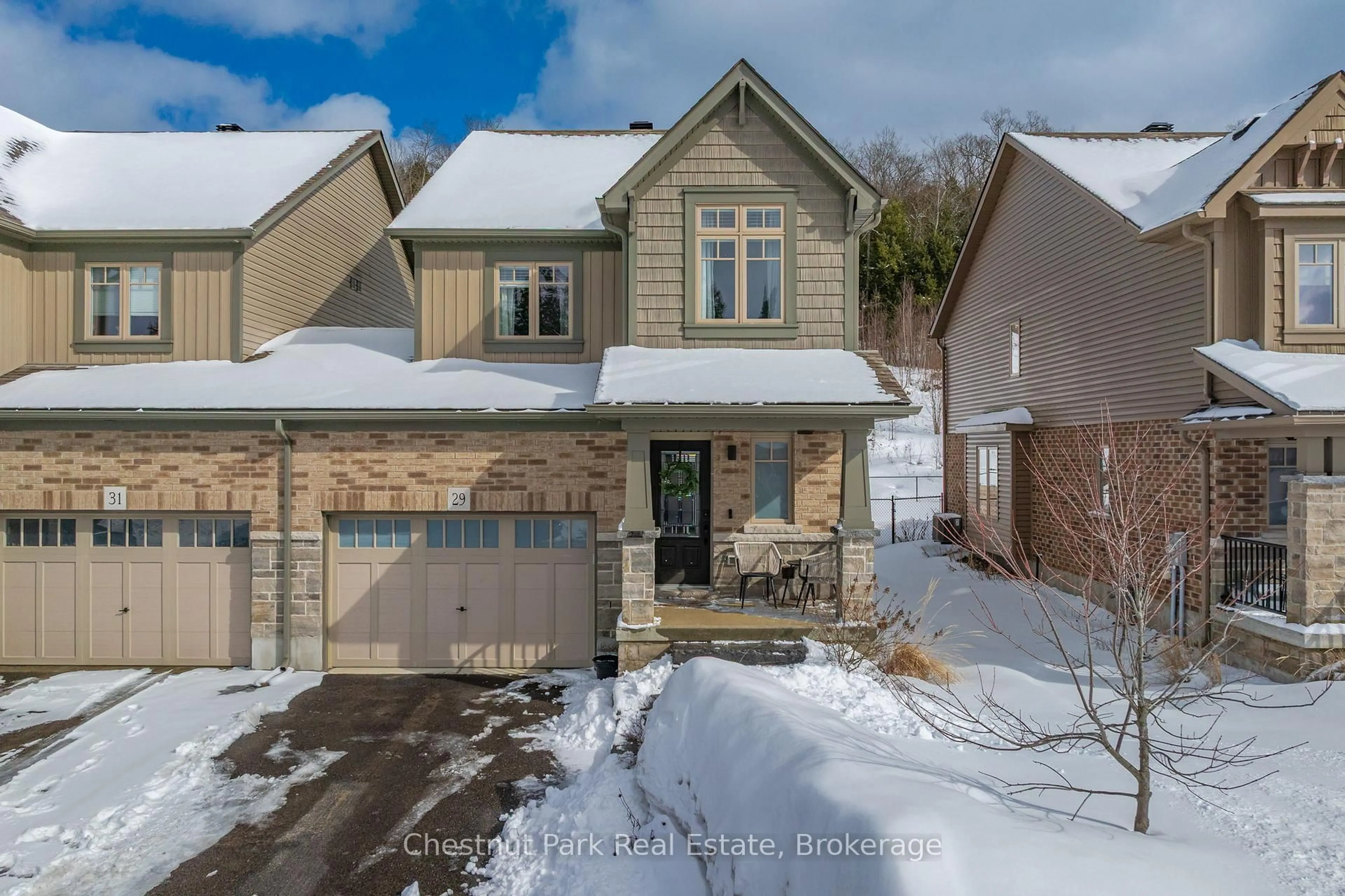 A pic from outside/outdoor area/front of a property/back of a property/a pic from drone, street for 29 Kelsey Madison Crt, Huntsville Ontario P1H 1C8