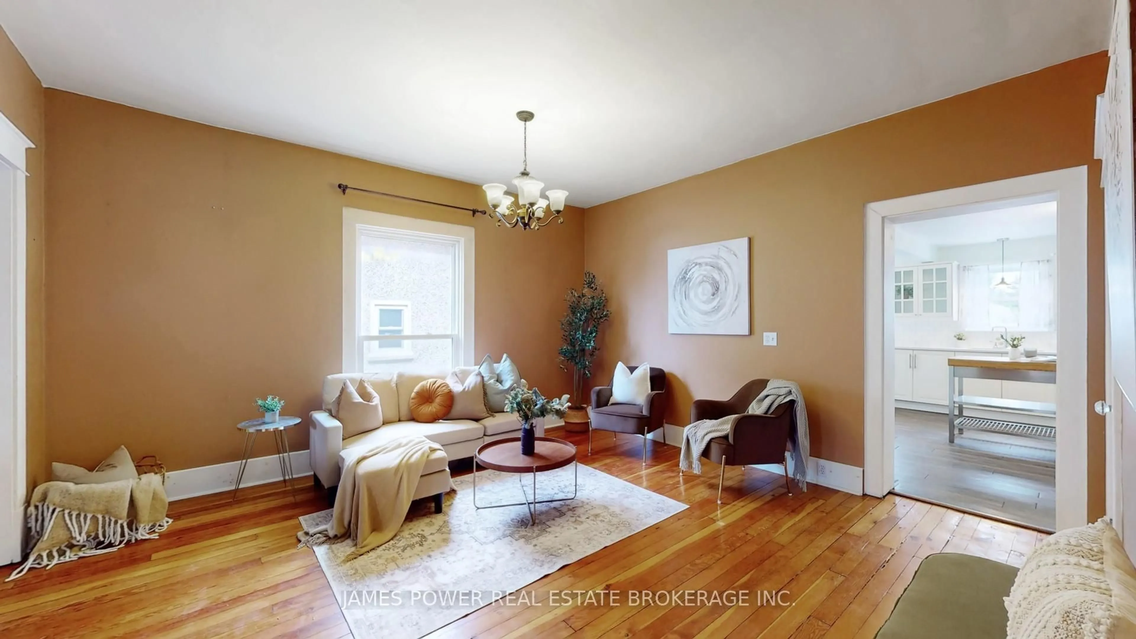 Living room with furniture, wood/laminate floor for 14 Grandview St, Brantford Ontario N3R 1Y4