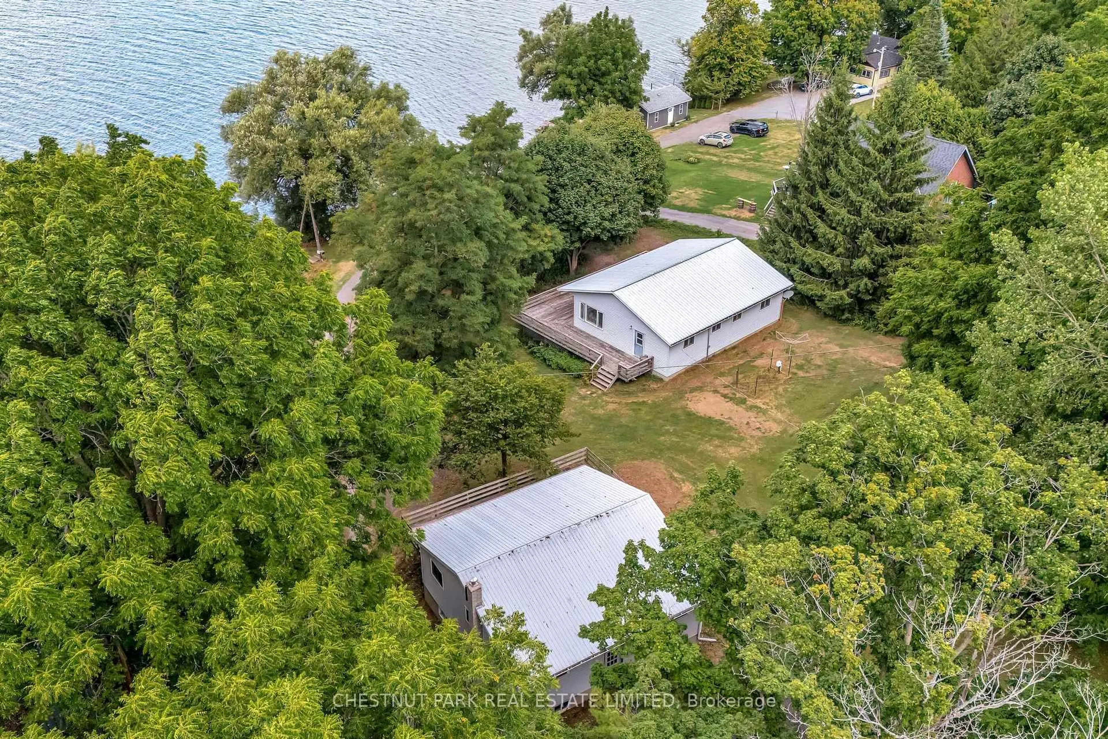 A pic from outside/outdoor area/front of a property/back of a property/a pic from drone, water/lake/river/ocean view for 84-88 Munroe Lane, Prince Edward County Ontario K0K 2T0