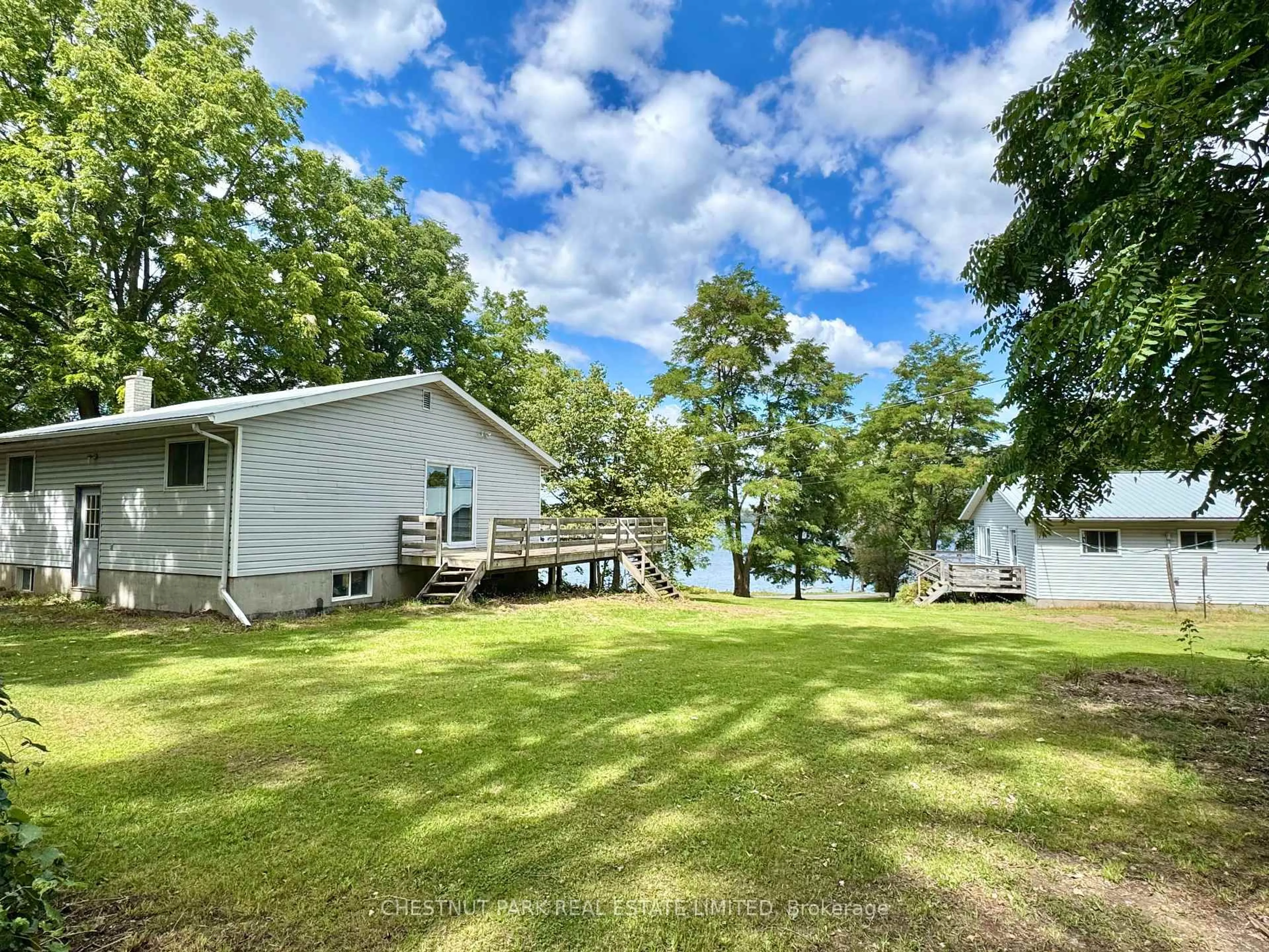 A pic from outside/outdoor area/front of a property/back of a property/a pic from drone, water/lake/river/ocean view for 84-88 Munroe Lane, Prince Edward County Ontario K0K 2T0