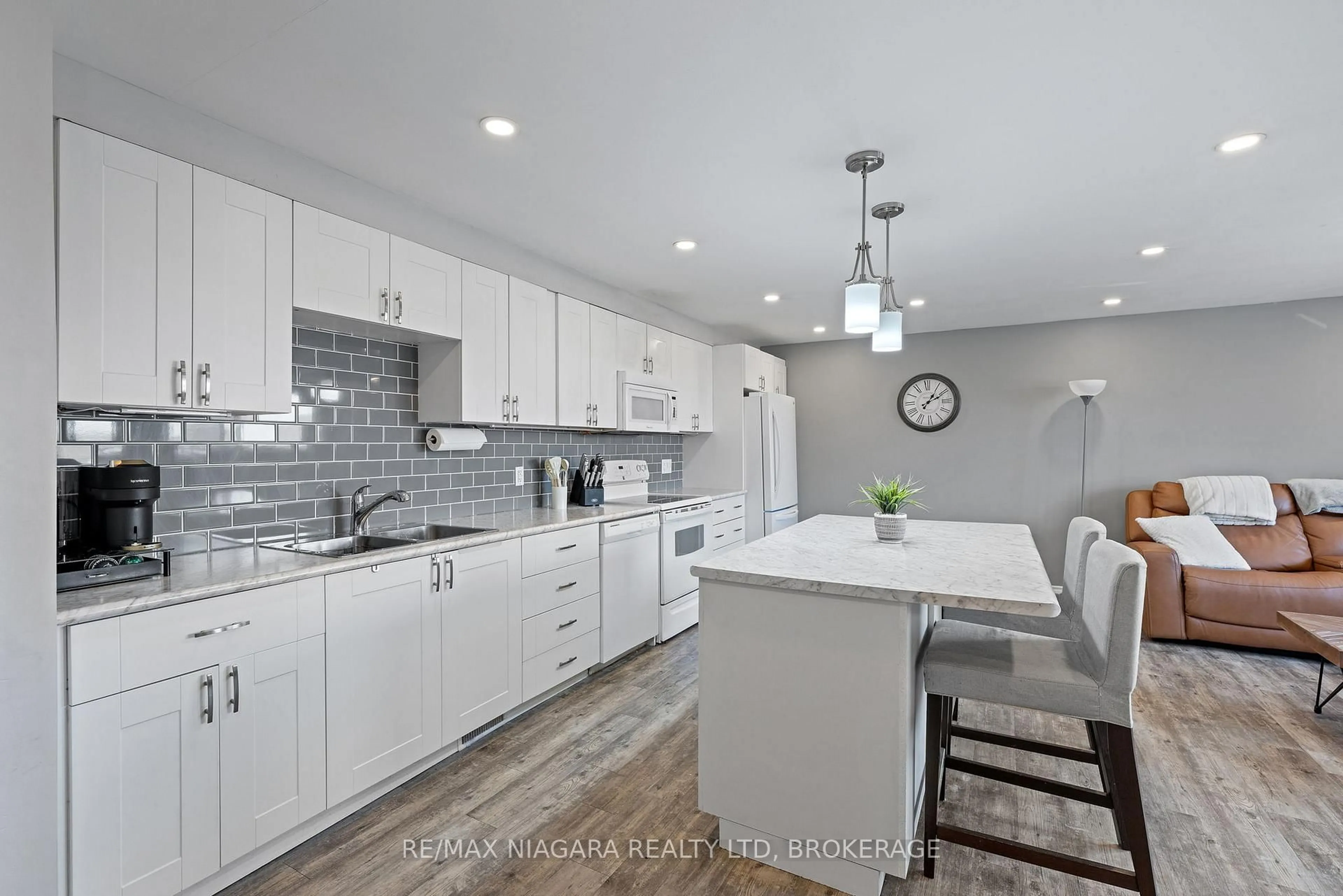 Open concept kitchen, ceramic/tile floor for 198 Scott St #308, St. Catharines Ontario L2N 5T3