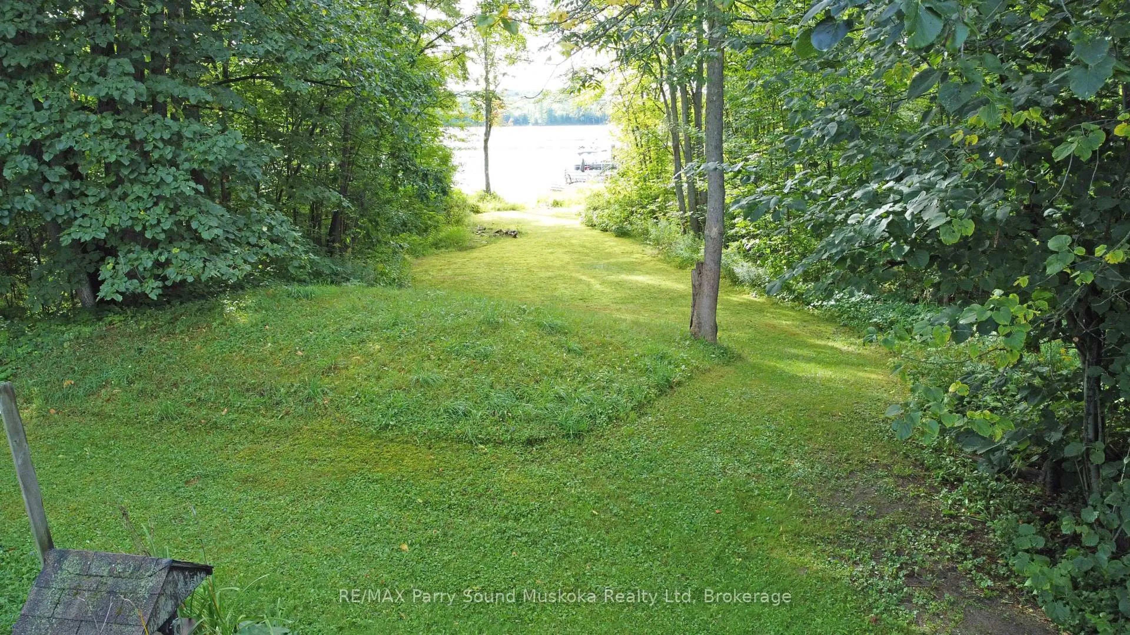 A pic from outside/outdoor area/front of a property/back of a property/a pic from drone, water/lake/river/ocean view for 9 Fisher Lane, Whitestone Ontario P0A 1G0