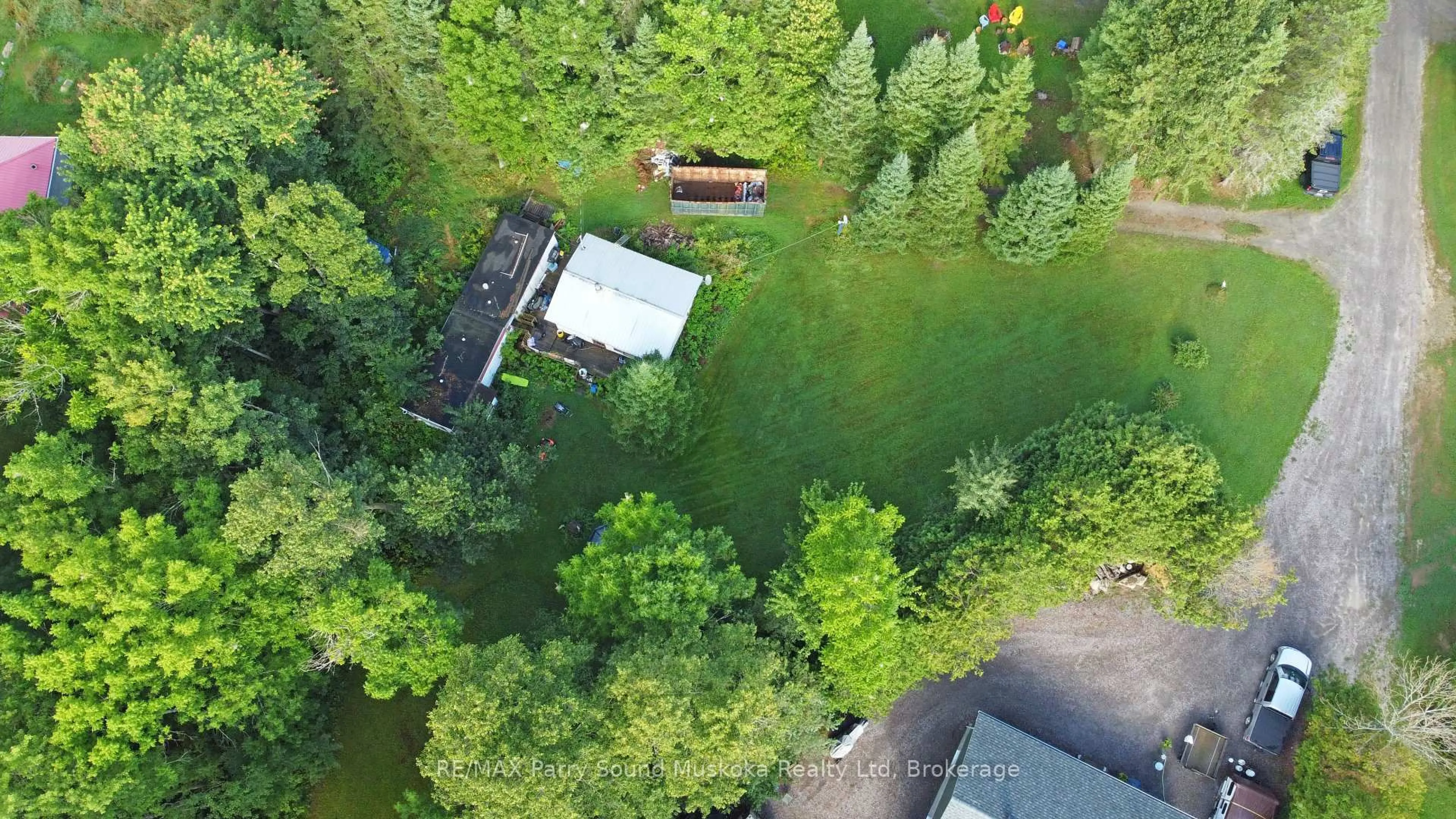 A pic from outside/outdoor area/front of a property/back of a property/a pic from drone, water/lake/river/ocean view for 9 Fisher Lane, Whitestone Ontario P0A 1G0