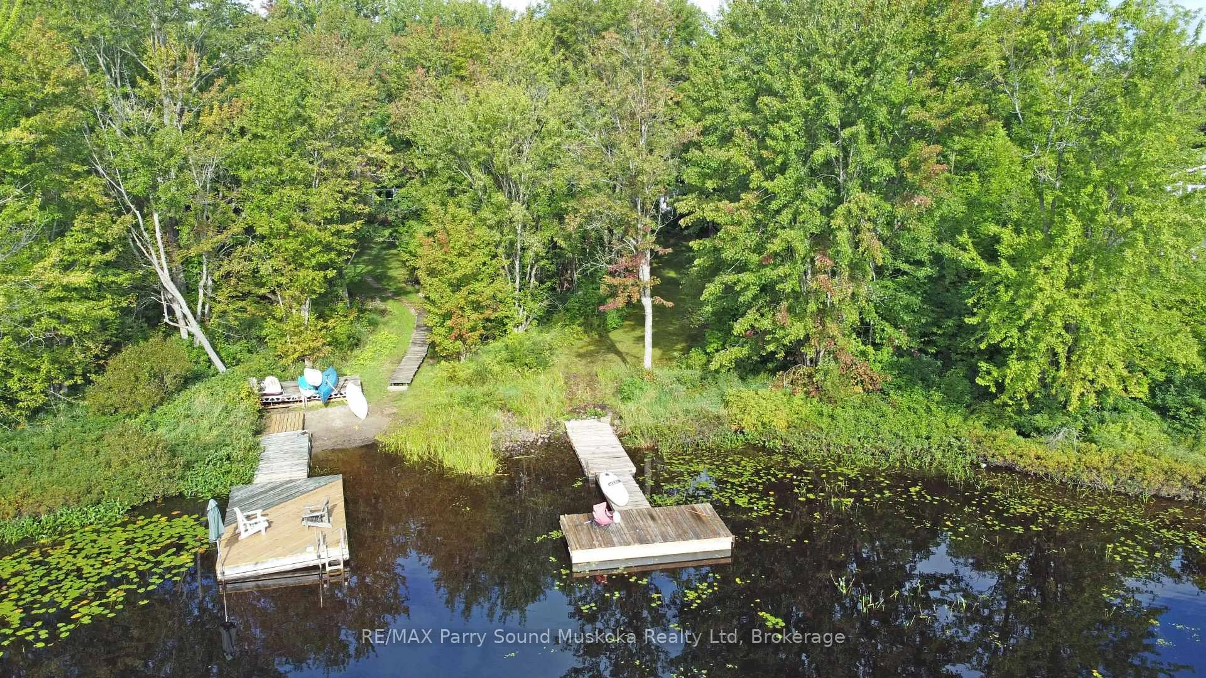 A pic from outside/outdoor area/front of a property/back of a property/a pic from drone, water/lake/river/ocean view for 9 Fisher Lane, Whitestone Ontario P0A 1G0