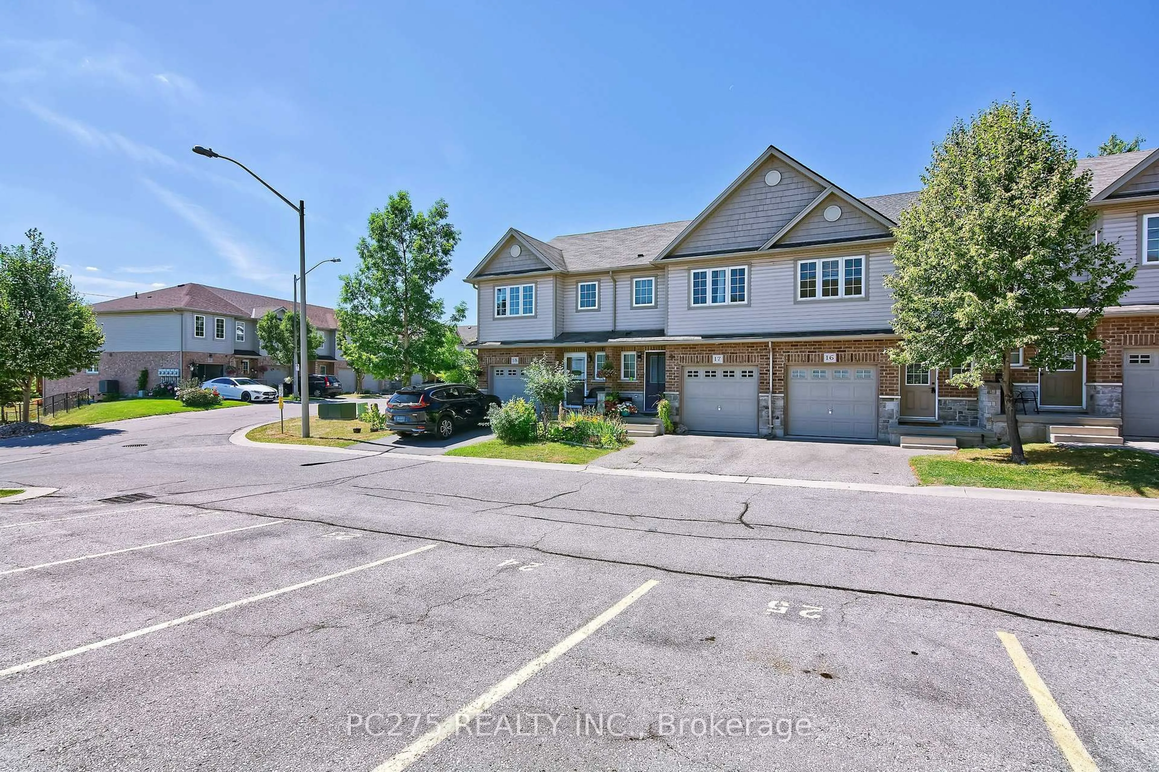 A pic from outside/outdoor area/front of a property/back of a property/a pic from drone, street for 355 Fisher Mills Rd #16, Cambridge Ontario N3C 4N5