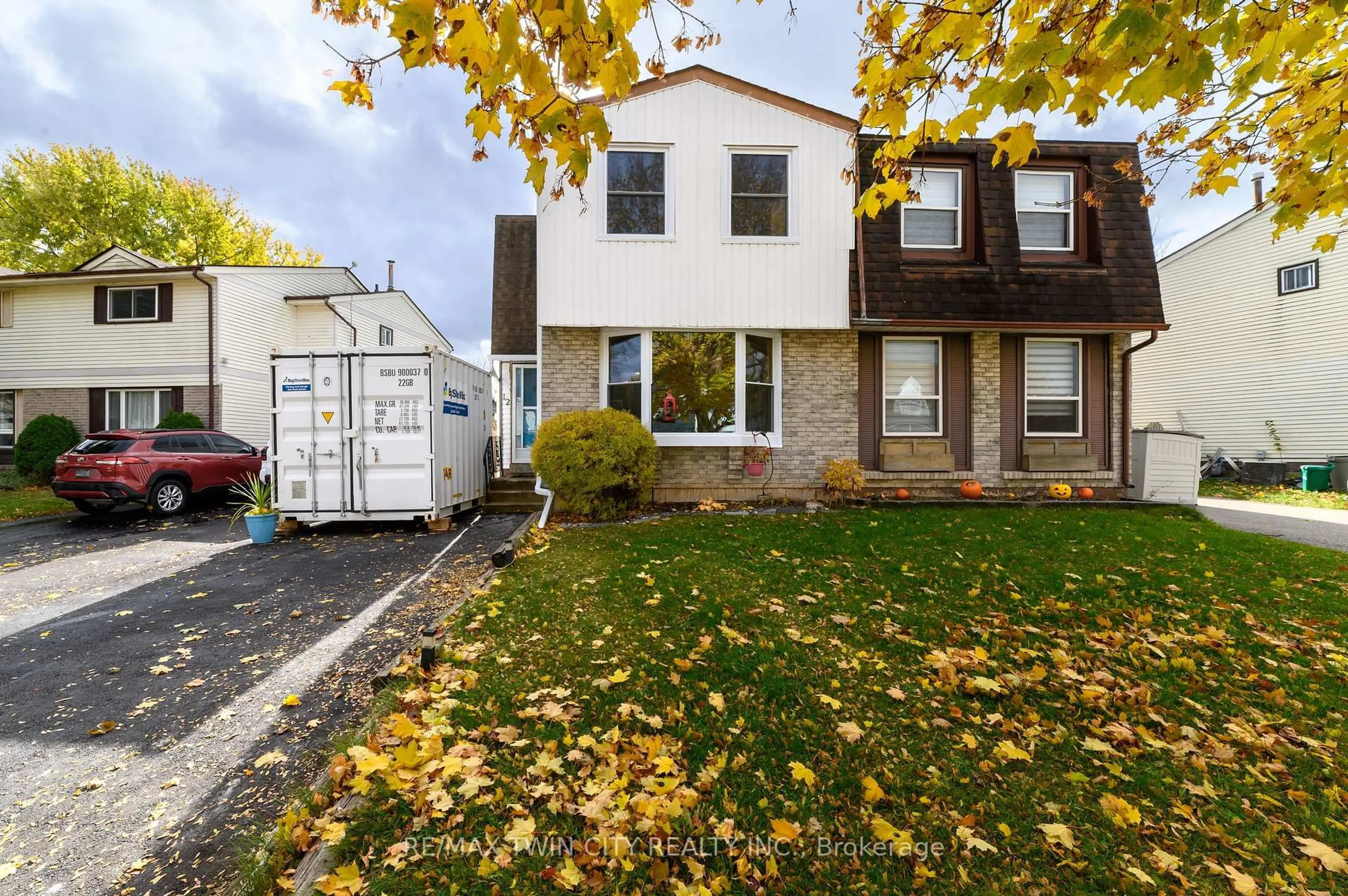 Home with vinyl exterior material, street for 12 White Owl Cres, Brantford Ontario N3P 1A2