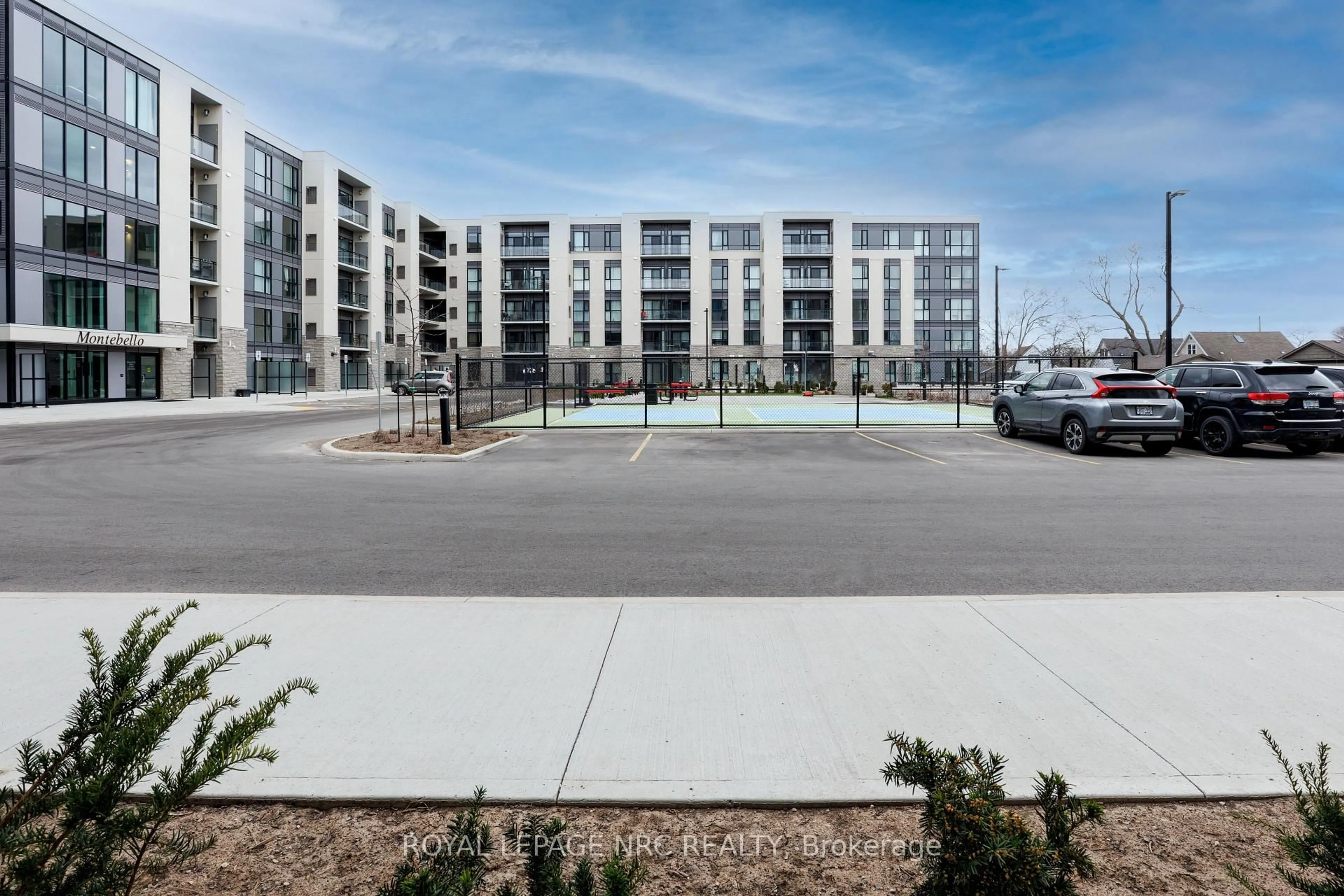 A pic from outside/outdoor area/front of a property/back of a property/a pic from drone, street for 50 HERRICK Ave #LP03, St. Catharines Ontario L2P 2T9