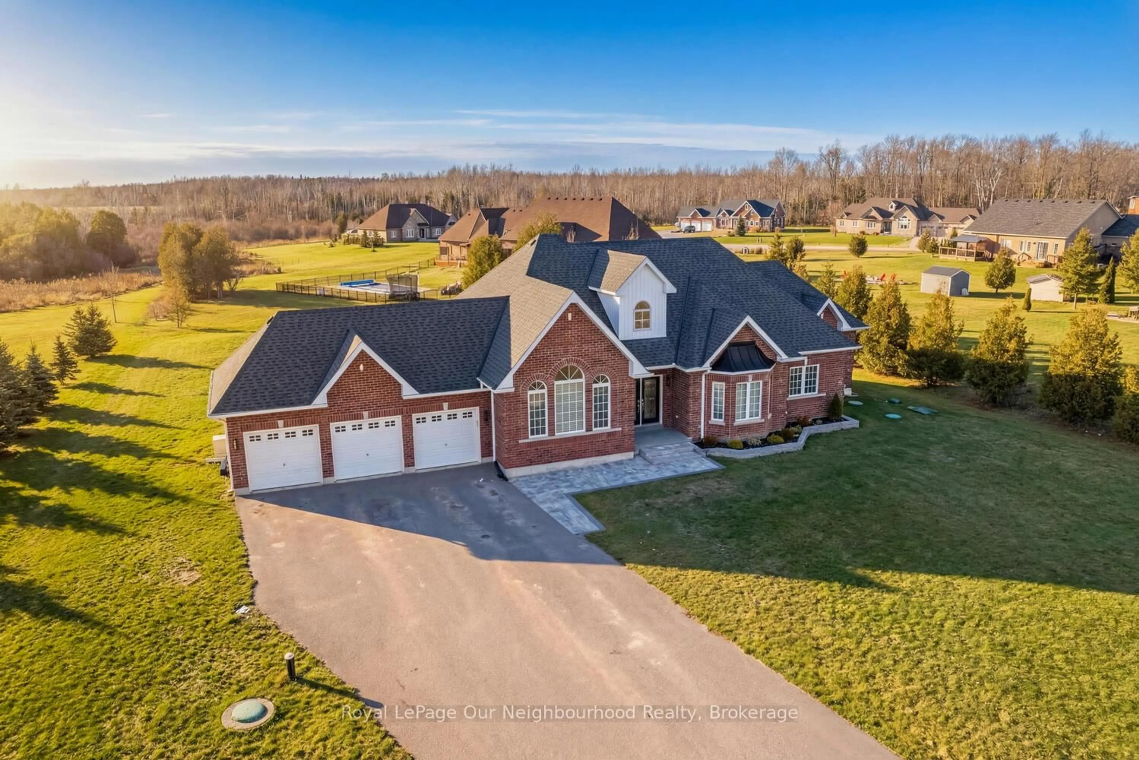A pic from outside/outdoor area/front of a property/back of a property/a pic from drone, unknown for 47 Songbird Cres, Kawartha Lakes Ontario K9V 0A9