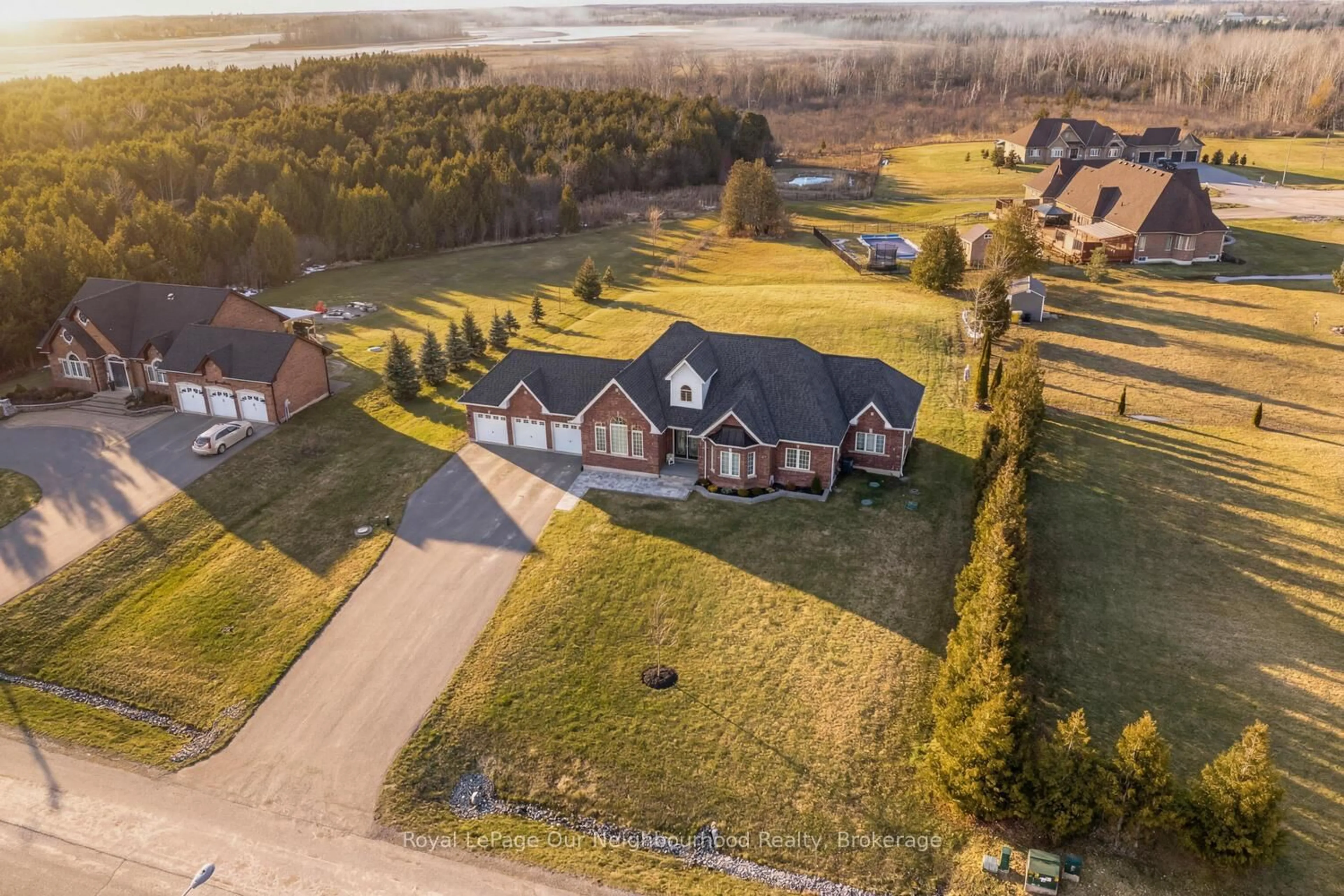 A pic from outside/outdoor area/front of a property/back of a property/a pic from drone, unknown for 47 Songbird Cres, Kawartha Lakes Ontario K9V 0A9