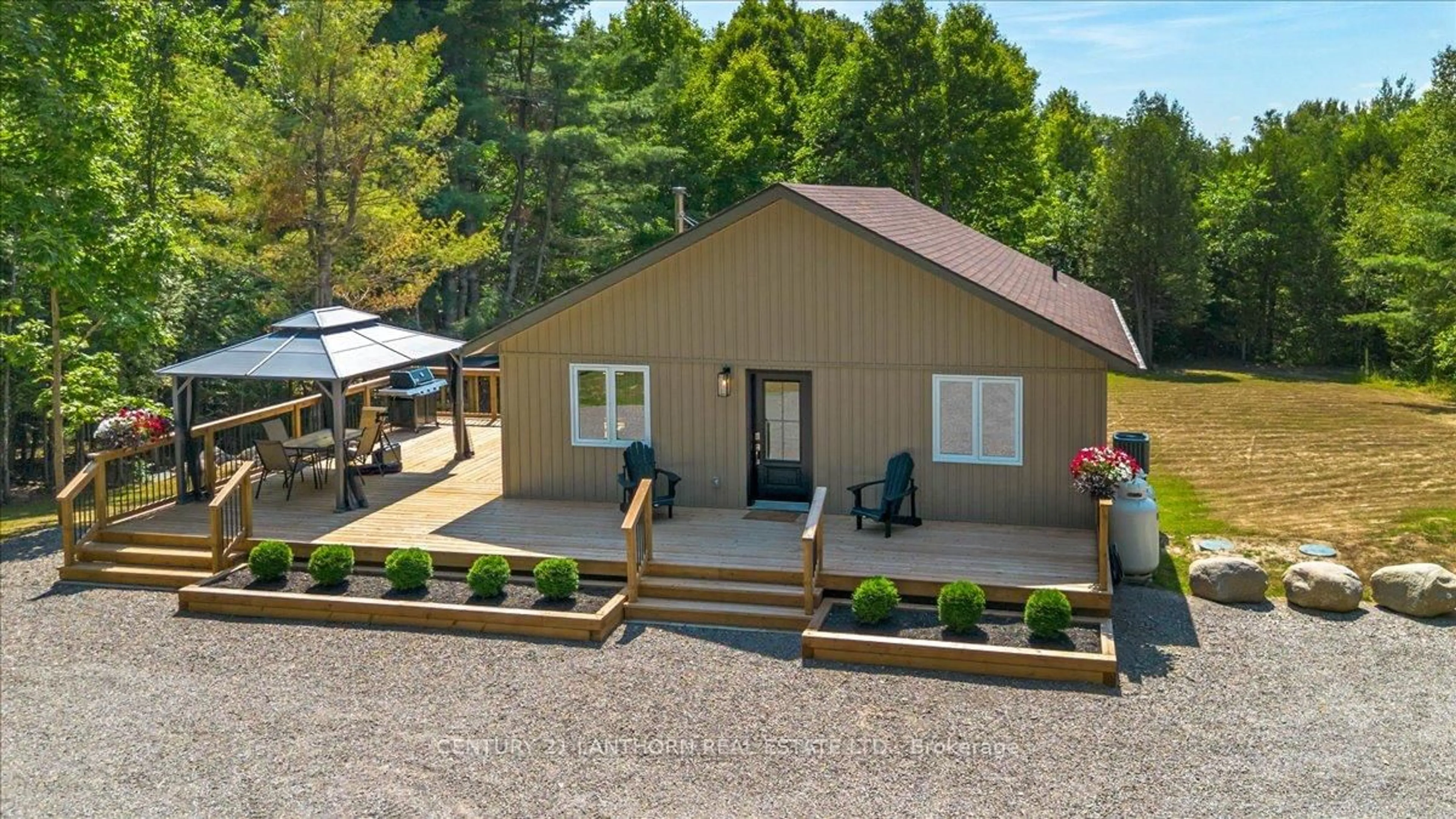 A pic from outside/outdoor area/front of a property/back of a property/a pic from drone, street for 101 Thompson Rd, Madoc Ontario K0K 2K0