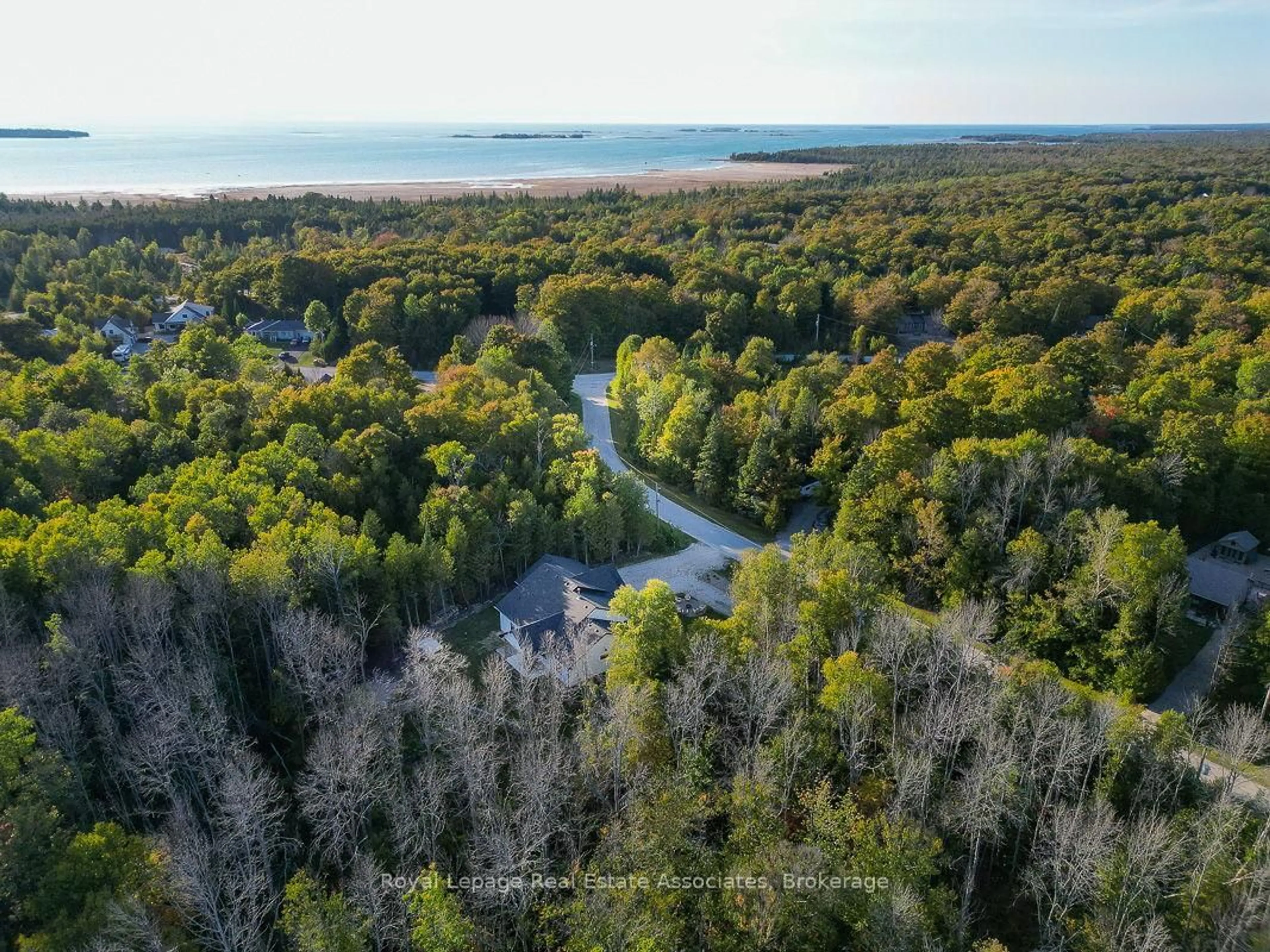 A pic from outside/outdoor area/front of a property/back of a property/a pic from drone, water/lake/river/ocean view for 18 Tamarac Rd, South Bruce Peninsula Ontario N0H 2T0