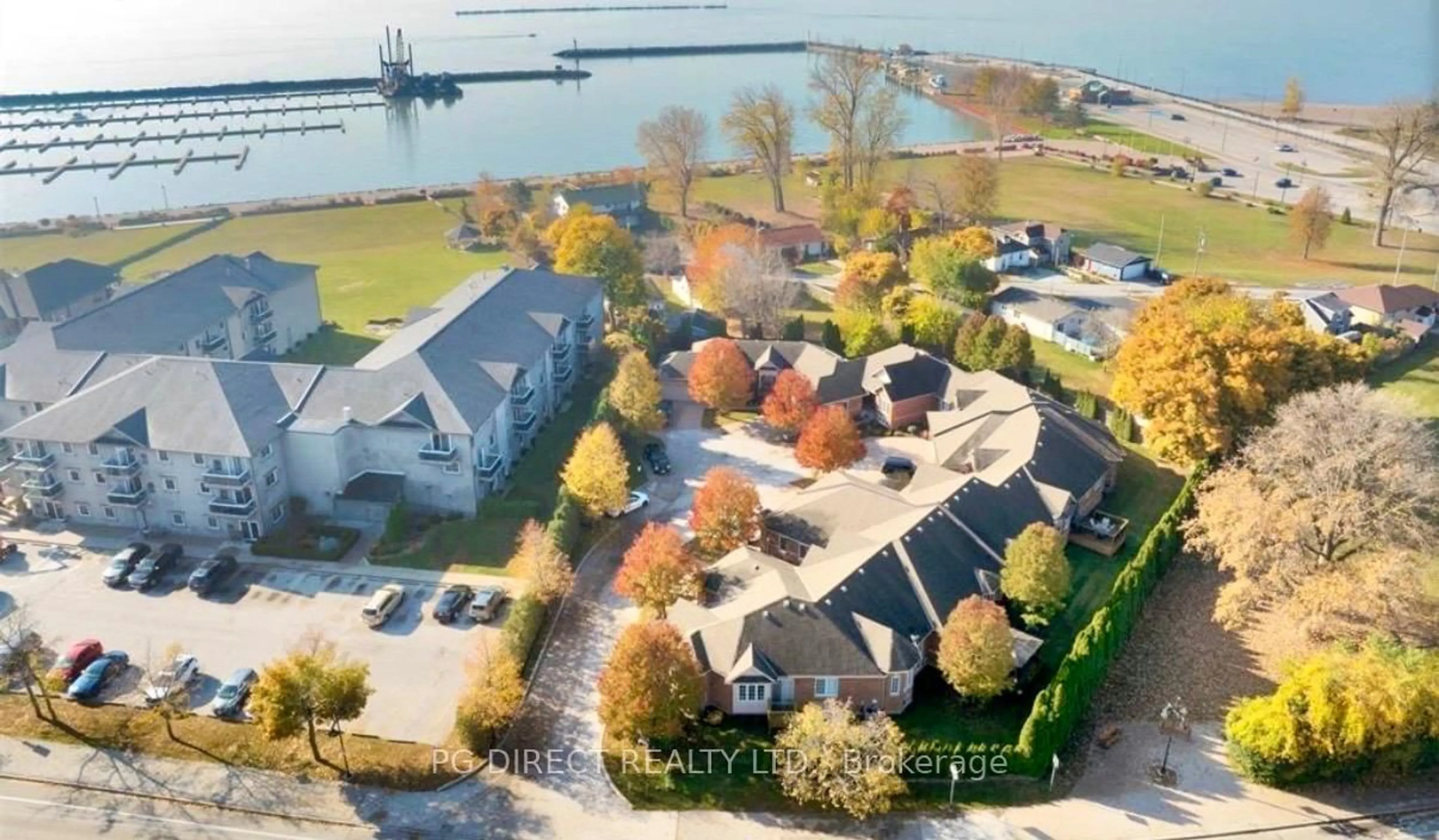 A pic from outside/outdoor area/front of a property/back of a property/a pic from drone, water/lake/river/ocean view for 32 Robson Rd #1, Leamington Ontario N8H 2M9