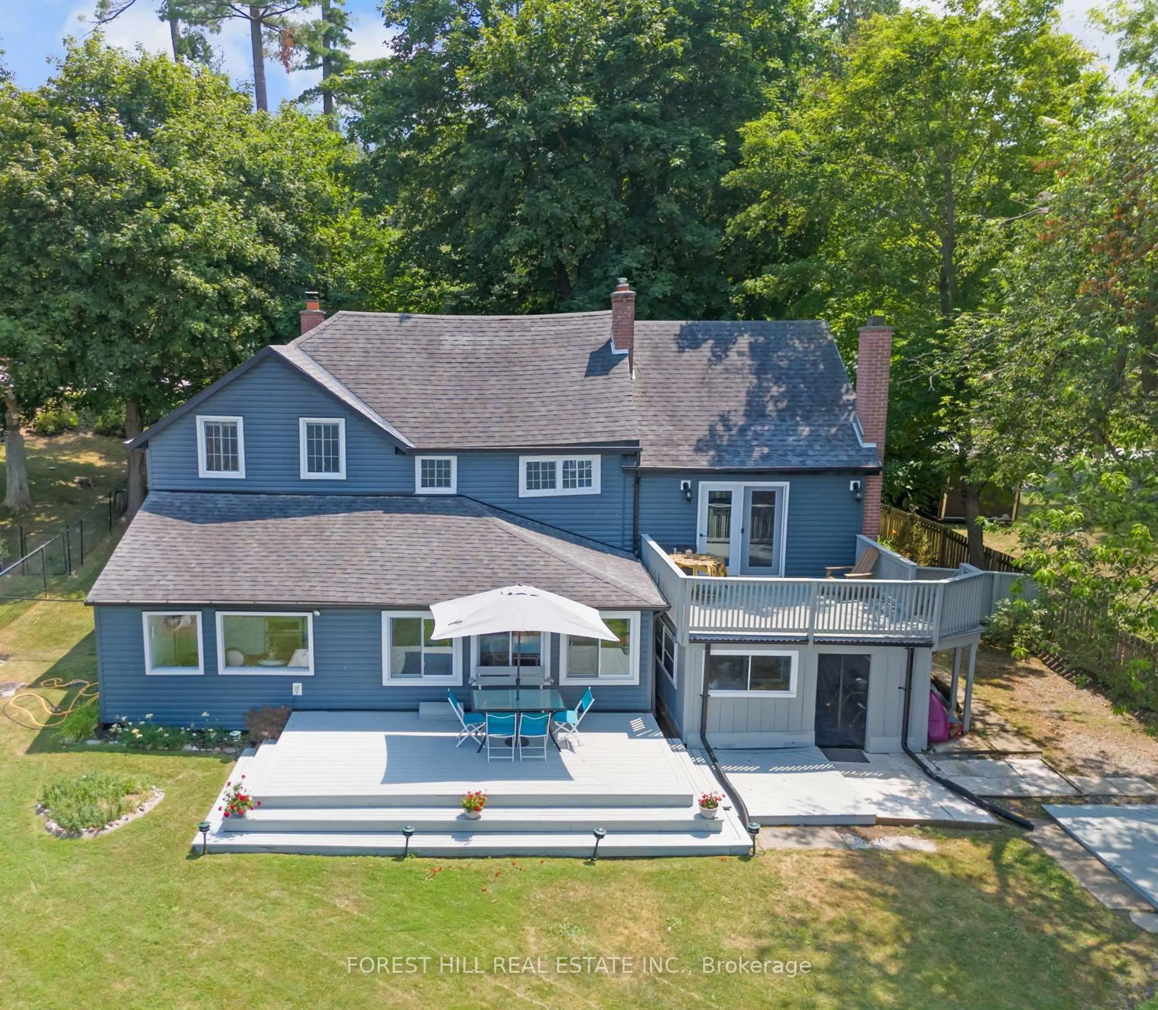 A pic from outside/outdoor area/front of a property/back of a property/a pic from drone, water/lake/river/ocean view for 672 Hatton Ave, Selwyn Ontario K0L 1H0