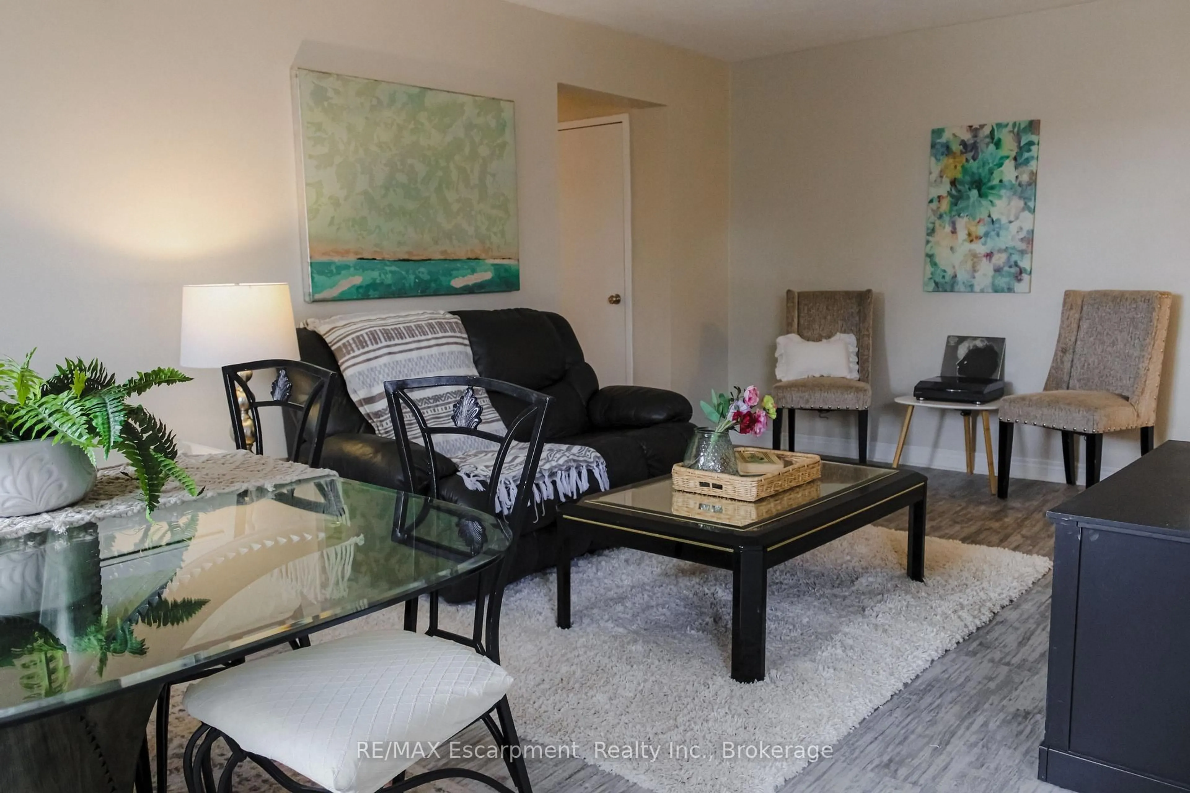 Living room with furniture, unknown for 485 Thorold Rd #203, Welland Ontario L3C 3X1