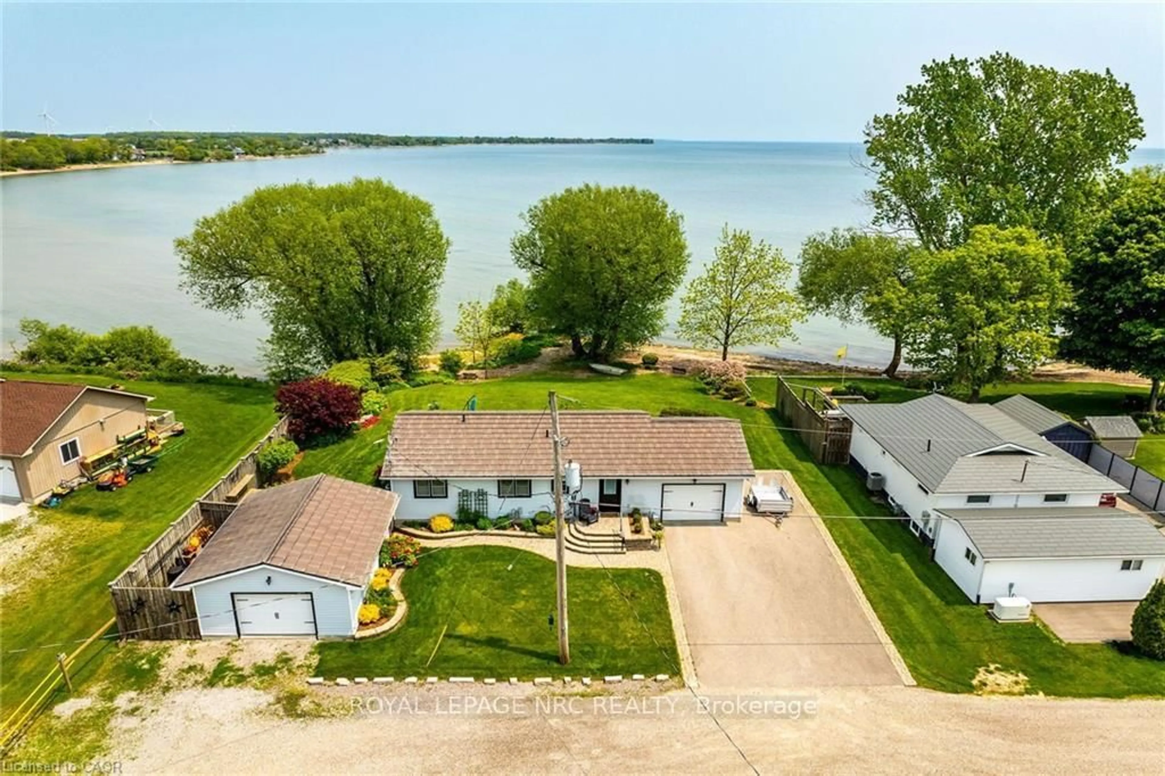 A pic from outside/outdoor area/front of a property/back of a property/a pic from drone, water/lake/river/ocean view for 92 Hoover Point Lane, Haldimand Ontario N0A 1P0