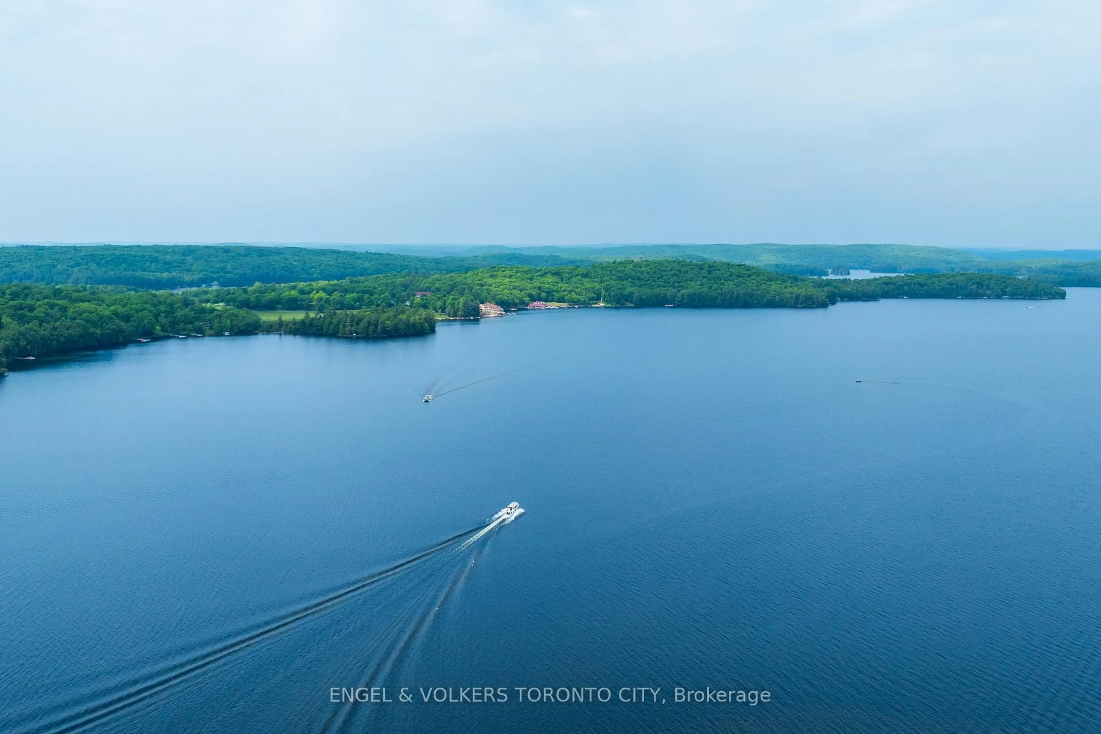 A pic from outside/outdoor area/front of a property/back of a property/a pic from drone, water/lake/river/ocean view for 12 Bigwin Island #221, Lake of Bays Ontario P0B 1A0