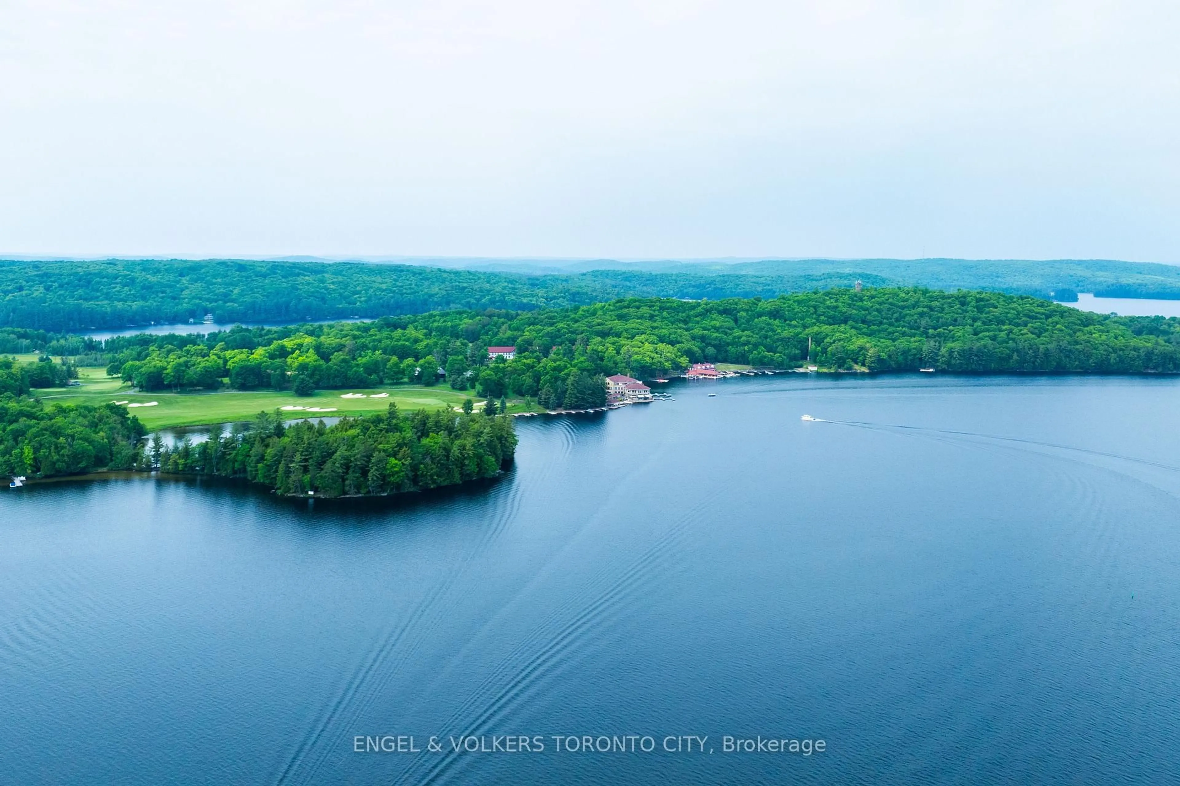 A pic from outside/outdoor area/front of a property/back of a property/a pic from drone, water/lake/river/ocean view for 12 Bigwin Island #221, Lake of Bays Ontario P0B 1A0