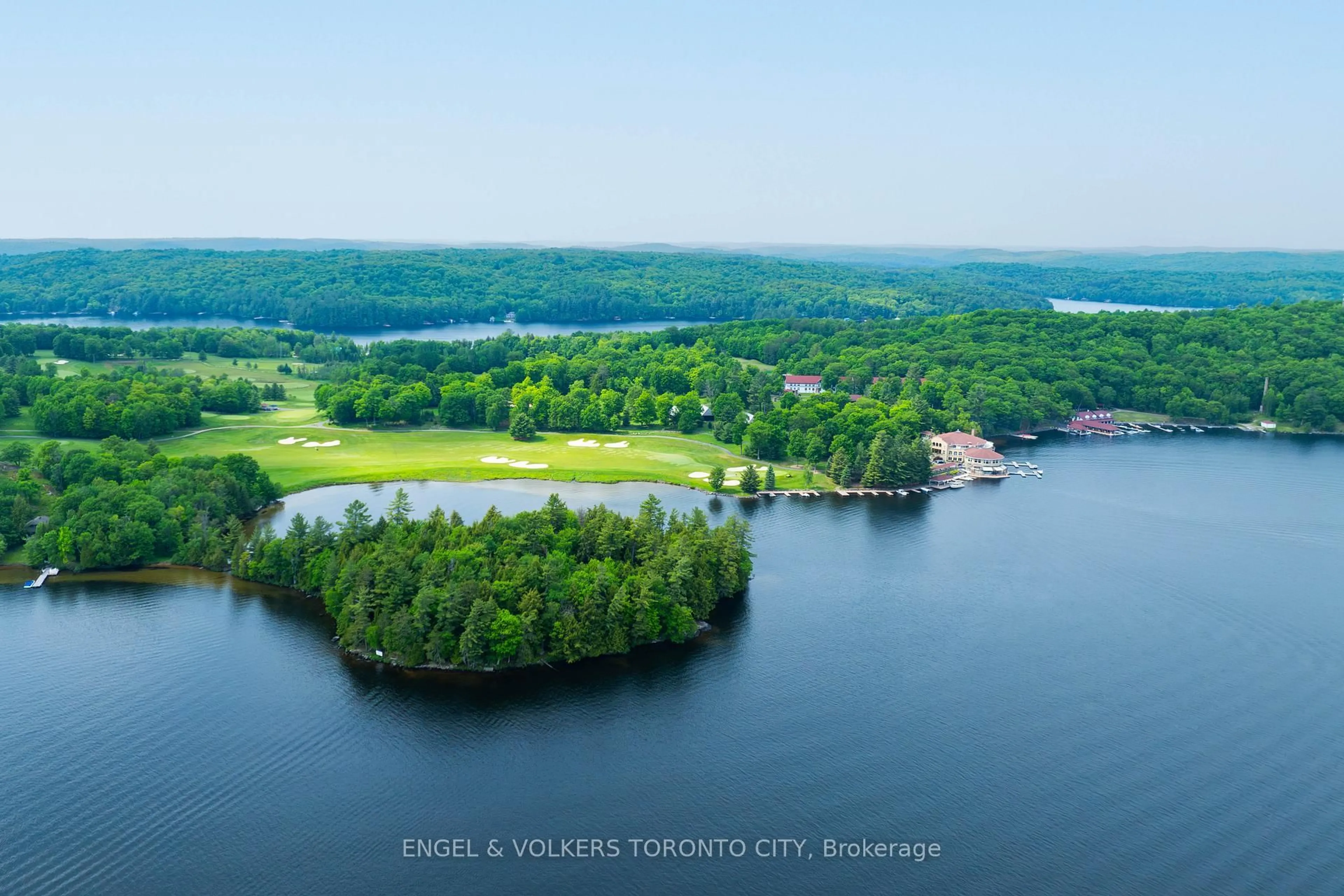 A pic from outside/outdoor area/front of a property/back of a property/a pic from drone, water/lake/river/ocean view for 12 Bigwin Island #221, Lake of Bays Ontario P0B 1A0