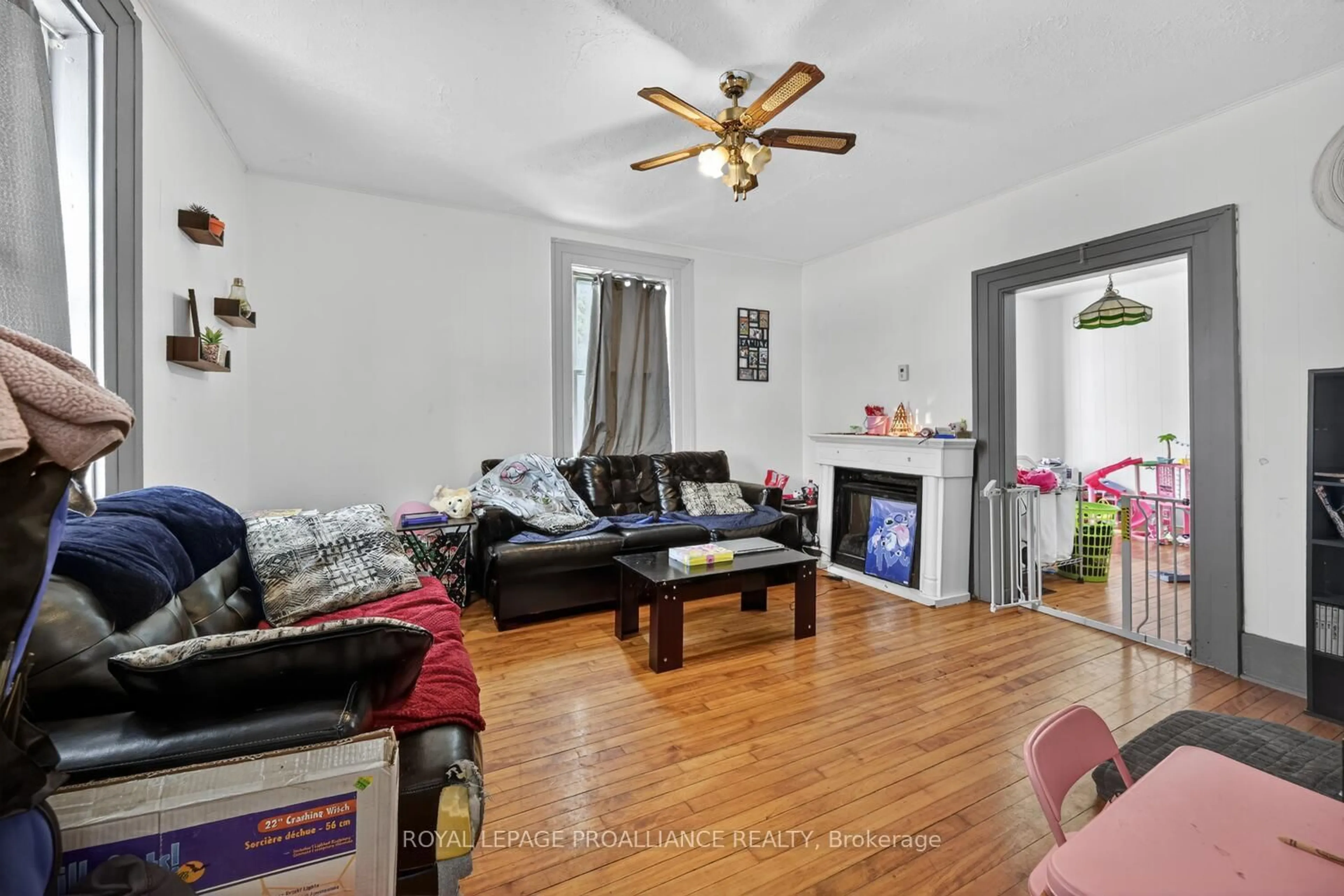 Living room with furniture, wood/laminate floor for 675 Zaire St, Prescott Ontario K0E 1T0