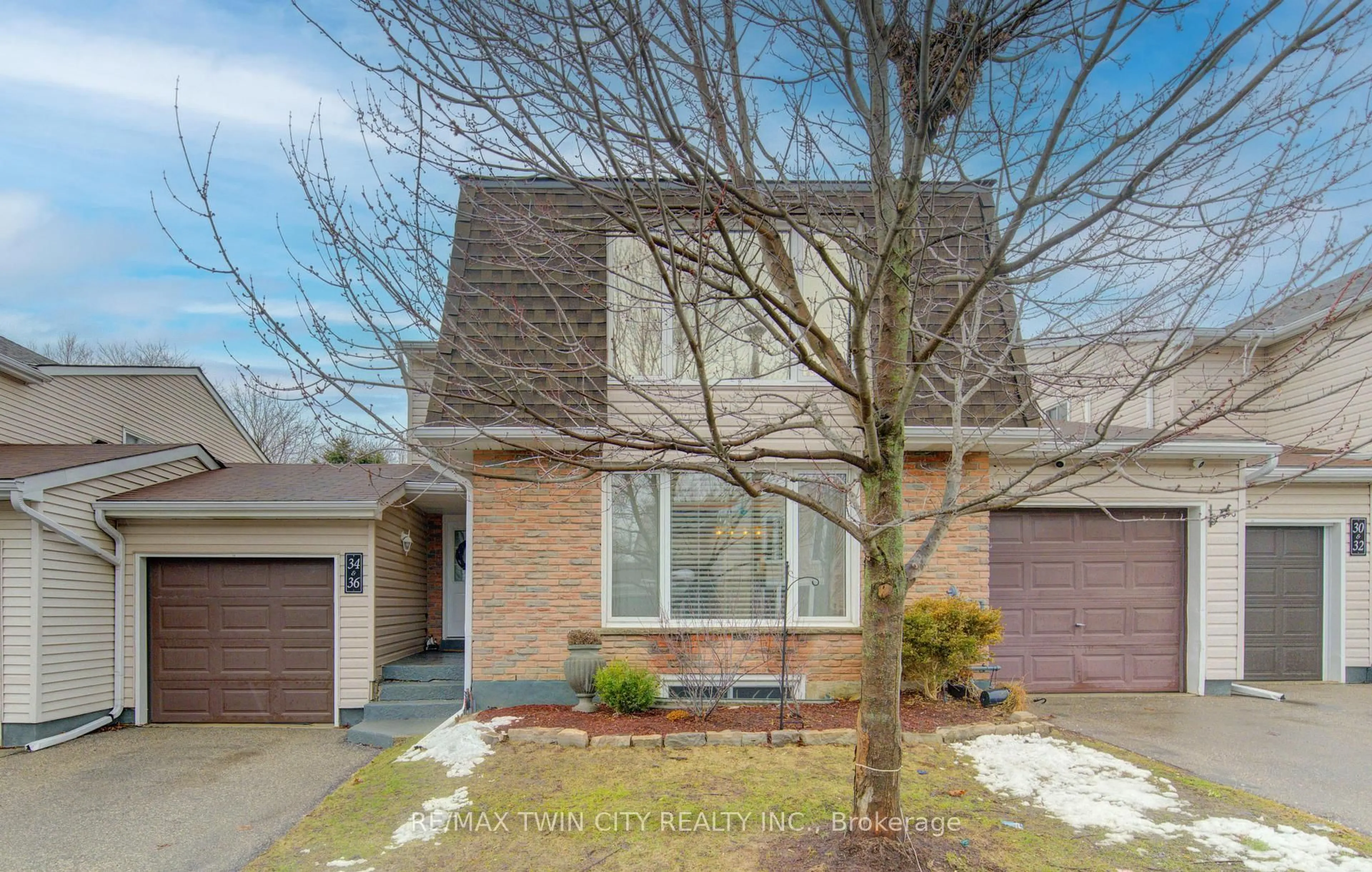 Home with brick exterior material, street for 175 Elm Ridge Dr #36, Kitchener Ontario N2N 1L7