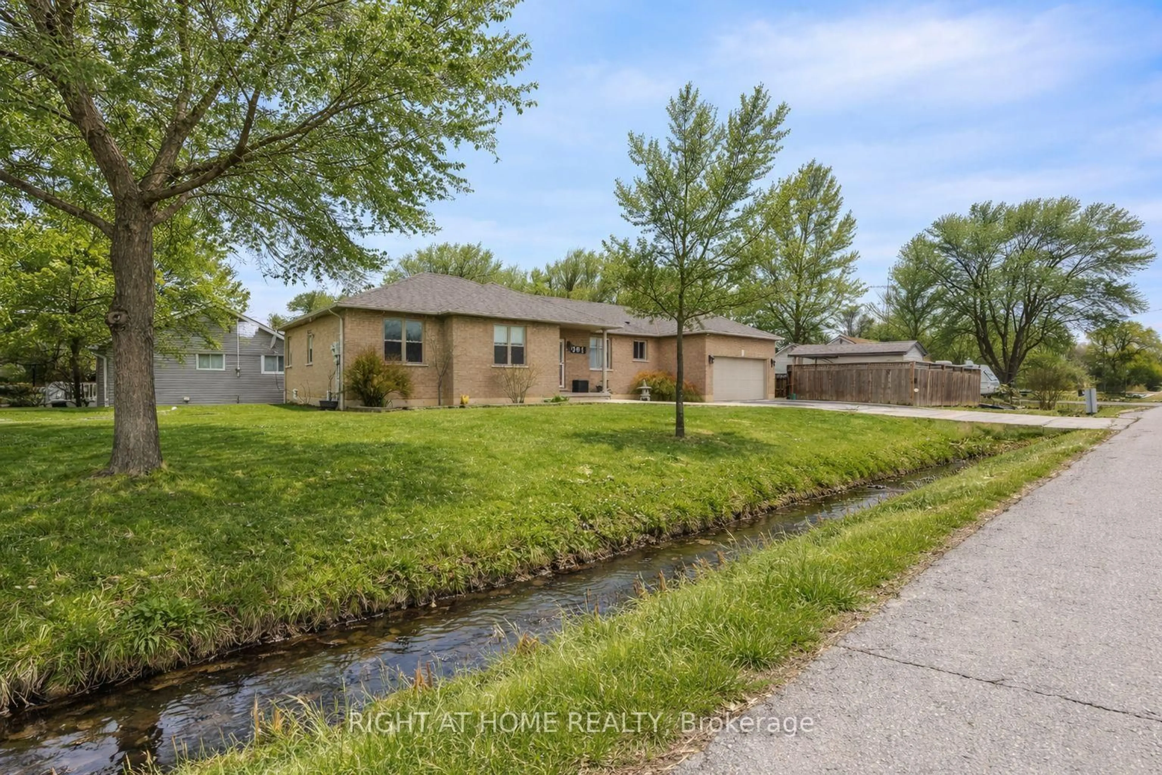 A pic from outside/outdoor area/front of a property/back of a property/a pic from drone, unknown for 301 Mud St, Hamilton Ontario L8J 2X7