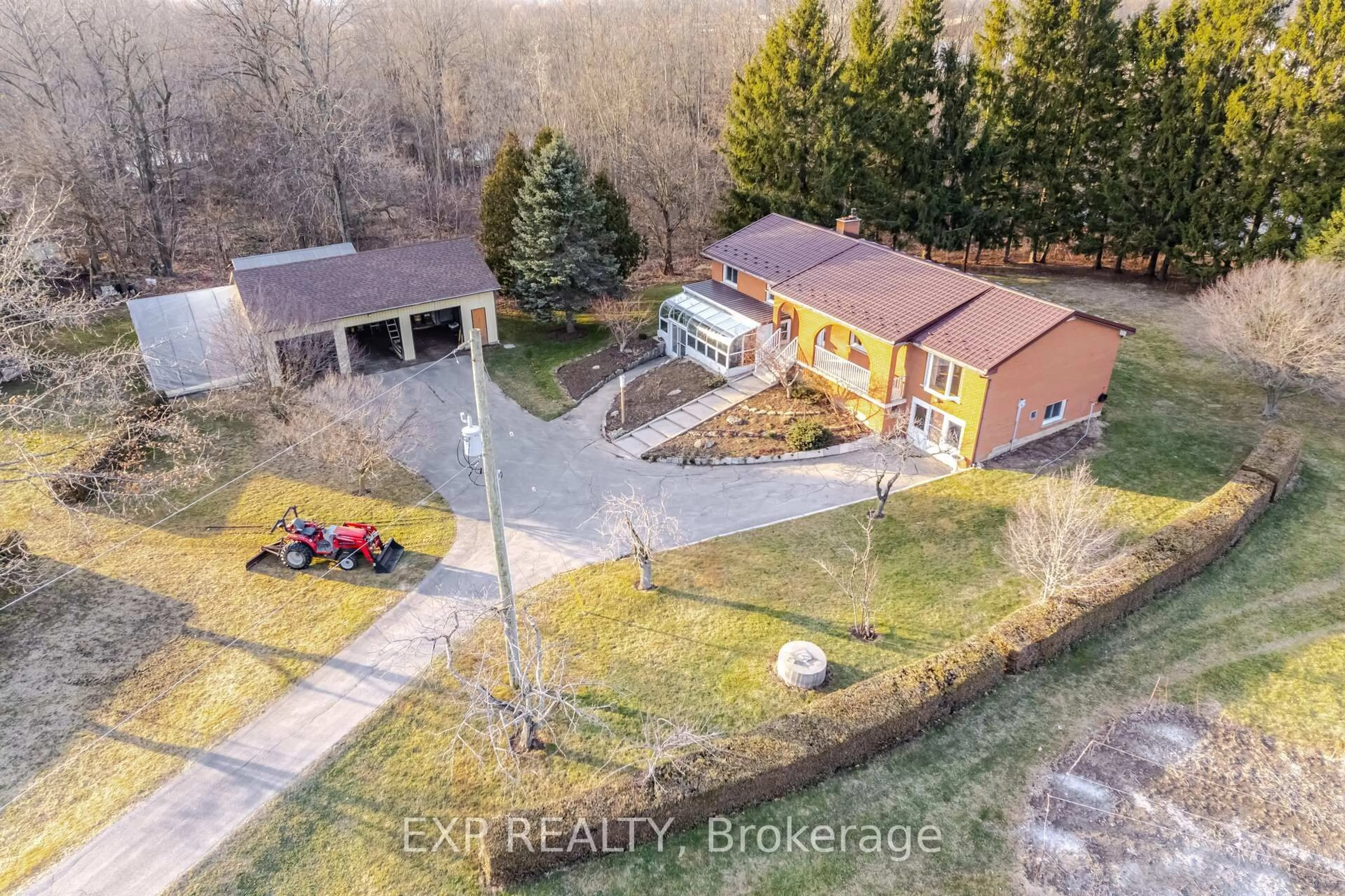 A pic from outside/outdoor area/front of a property/back of a property/a pic from drone, unknown for 1243 5 Highway, Hamilton Ontario L9H 5E1