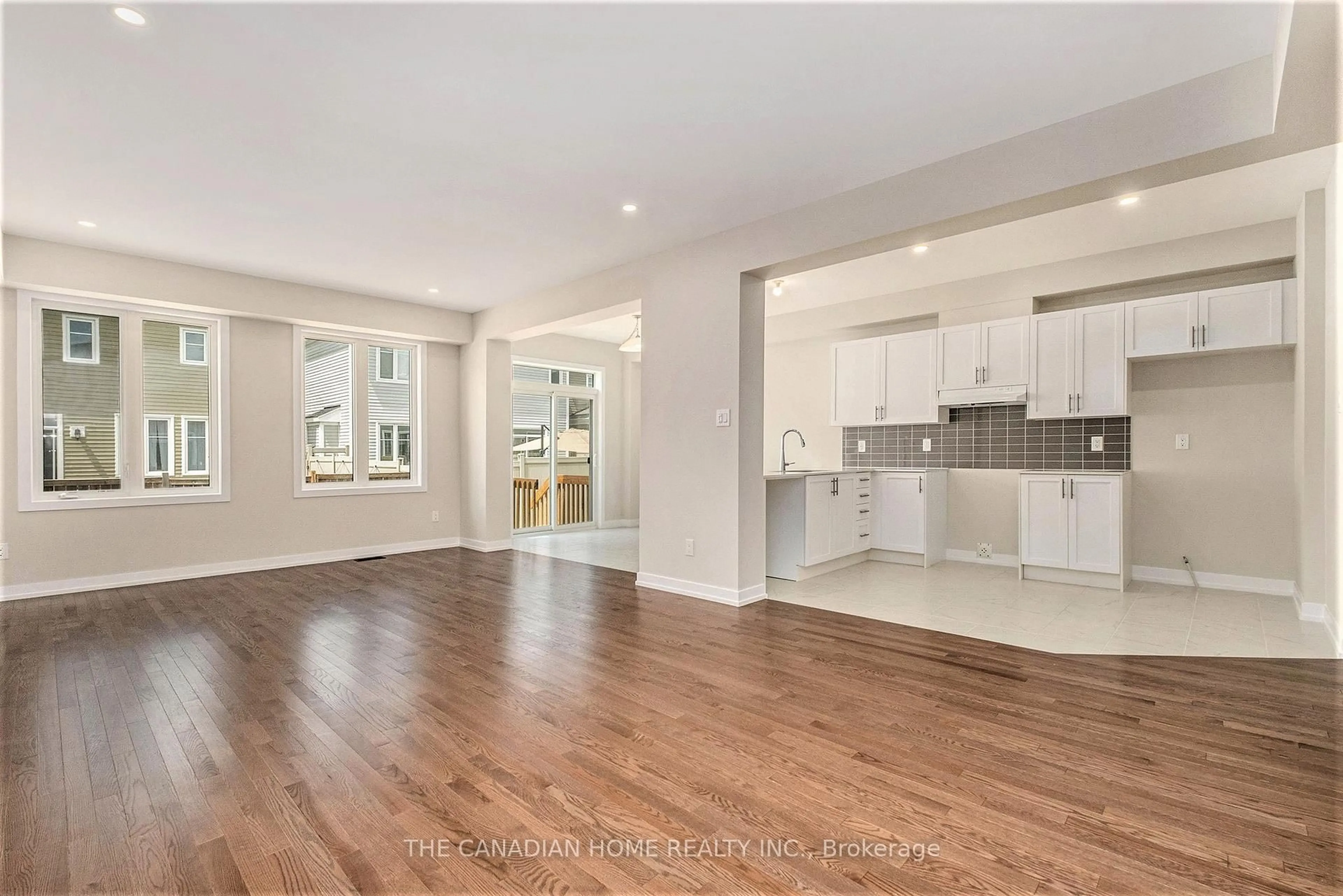Open concept kitchen, wood/laminate floor for 73 Hackamore Cres, Richmond Ontario K0A 2Z0