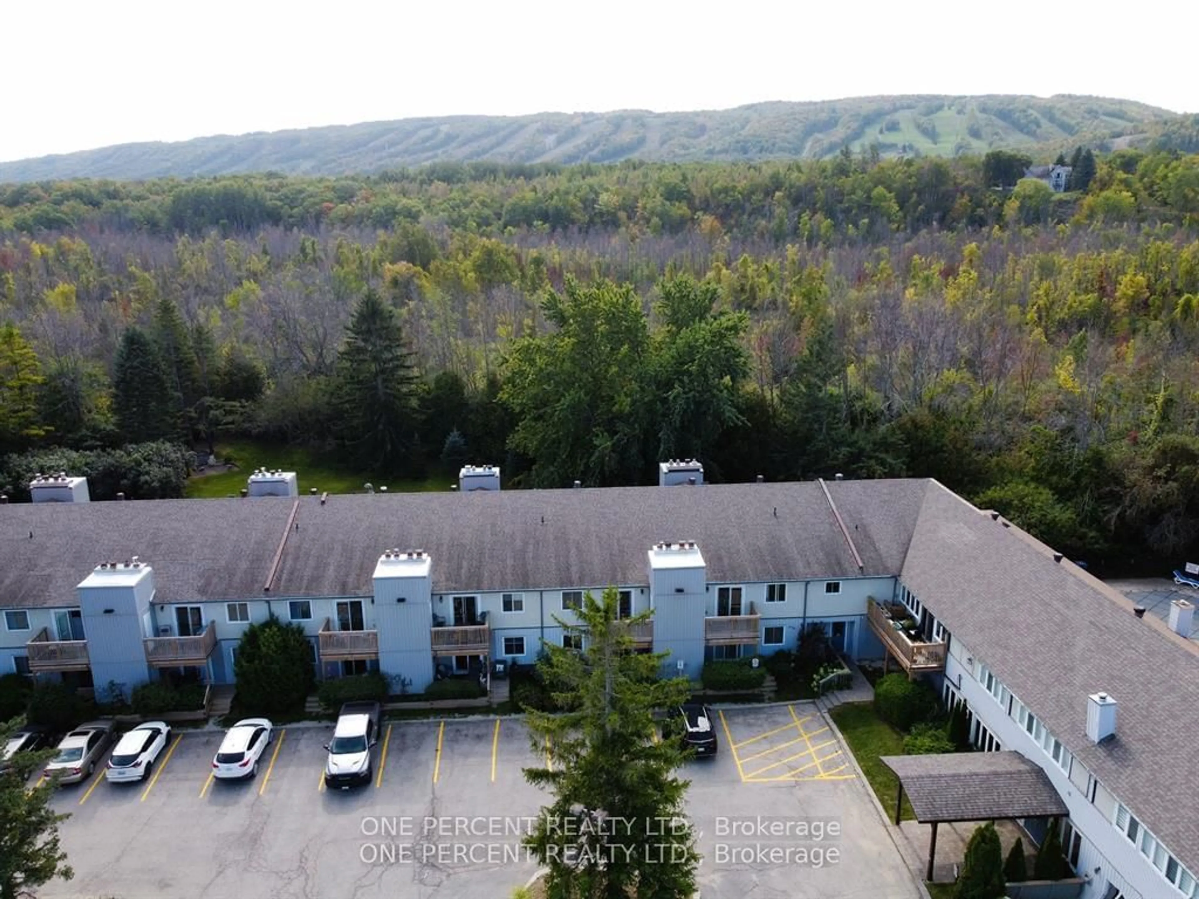 A pic from outside/outdoor area/front of a property/back of a property/a pic from drone, mountain view for 209472 Highway 26 Highway #31, Blue Mountains Ontario L9Y 0V3
