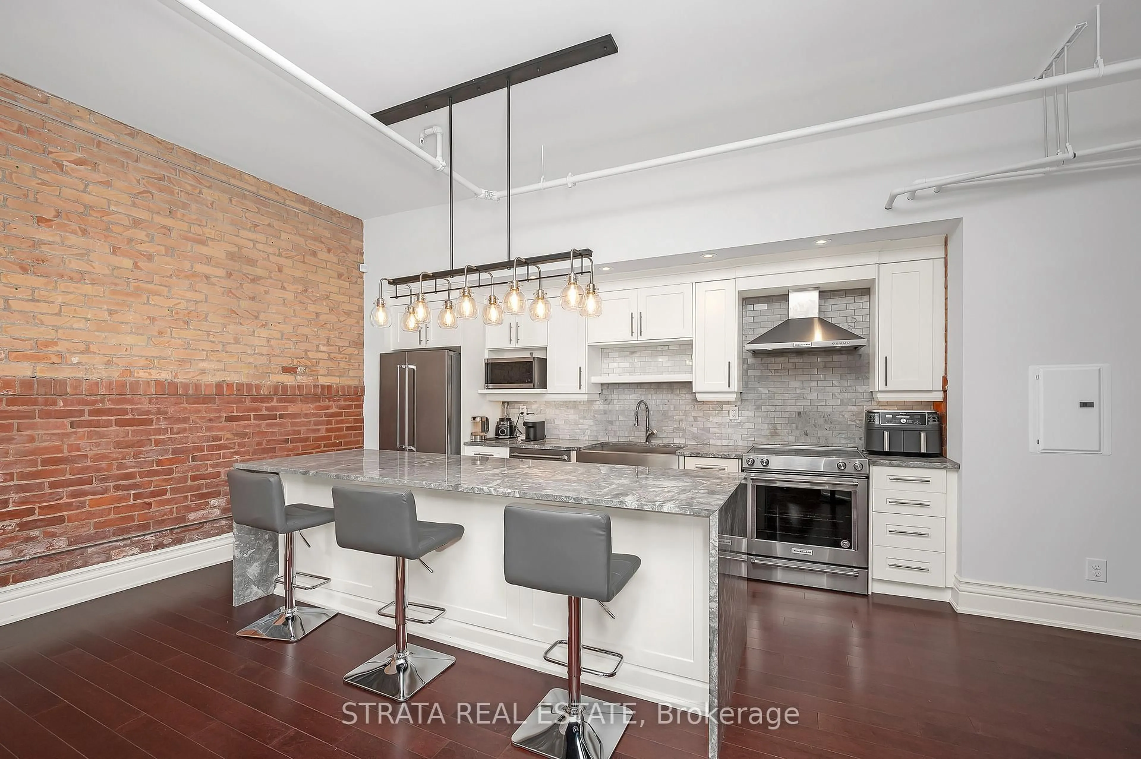 Open concept kitchen, ceramic/tile floor for 200 Stinson St #107, Hamilton Ontario L8N 4J5