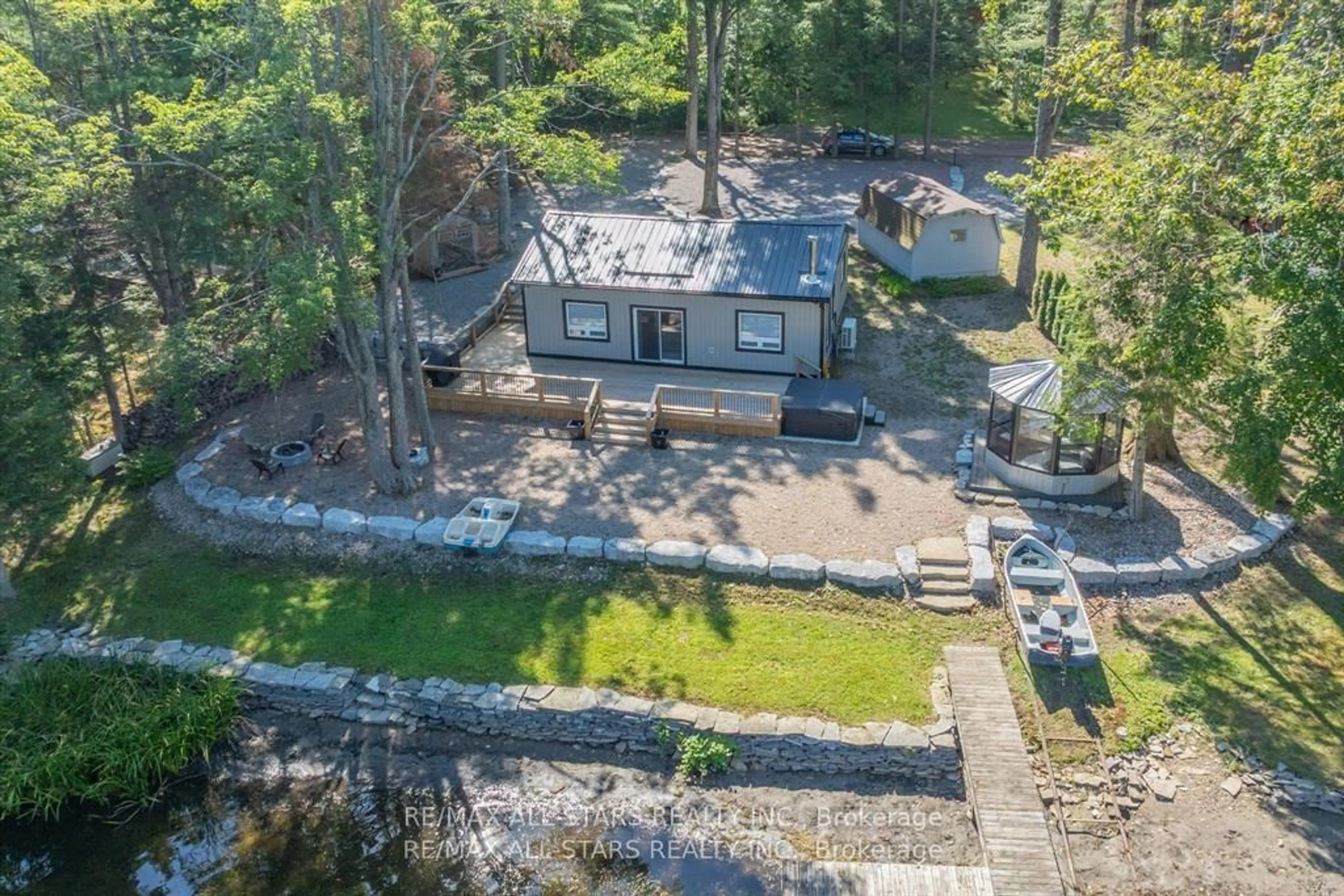 A pic from outside/outdoor area/front of a property/back of a property/a pic from drone, unknown for 11 Little Bay Dr, Kawartha Lakes Ontario K0M 2L0