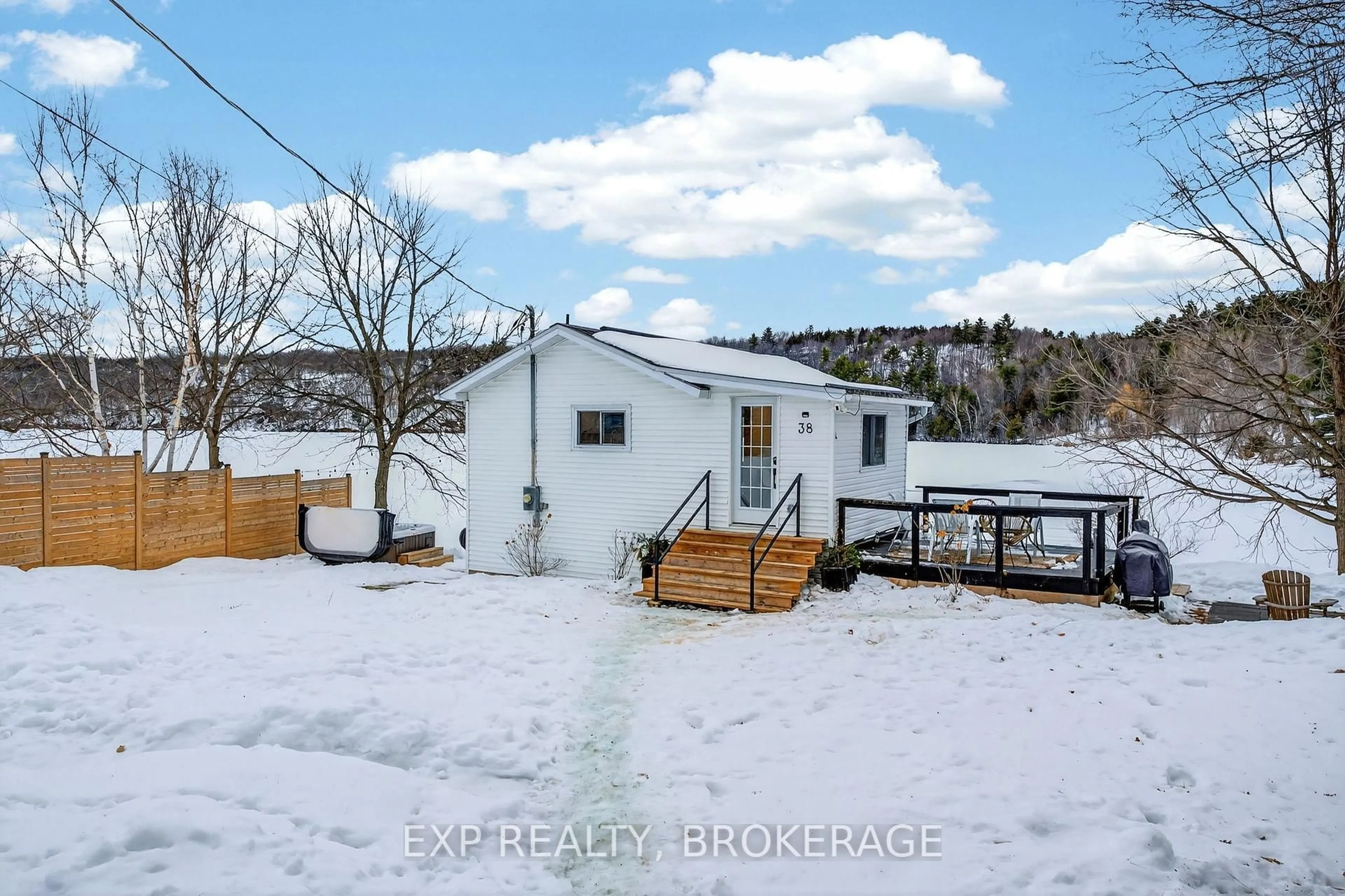 A pic from outside/outdoor area/front of a property/back of a property/a pic from drone, unknown for 38 Rebecca Lane, Westport Ontario K0G 1X0