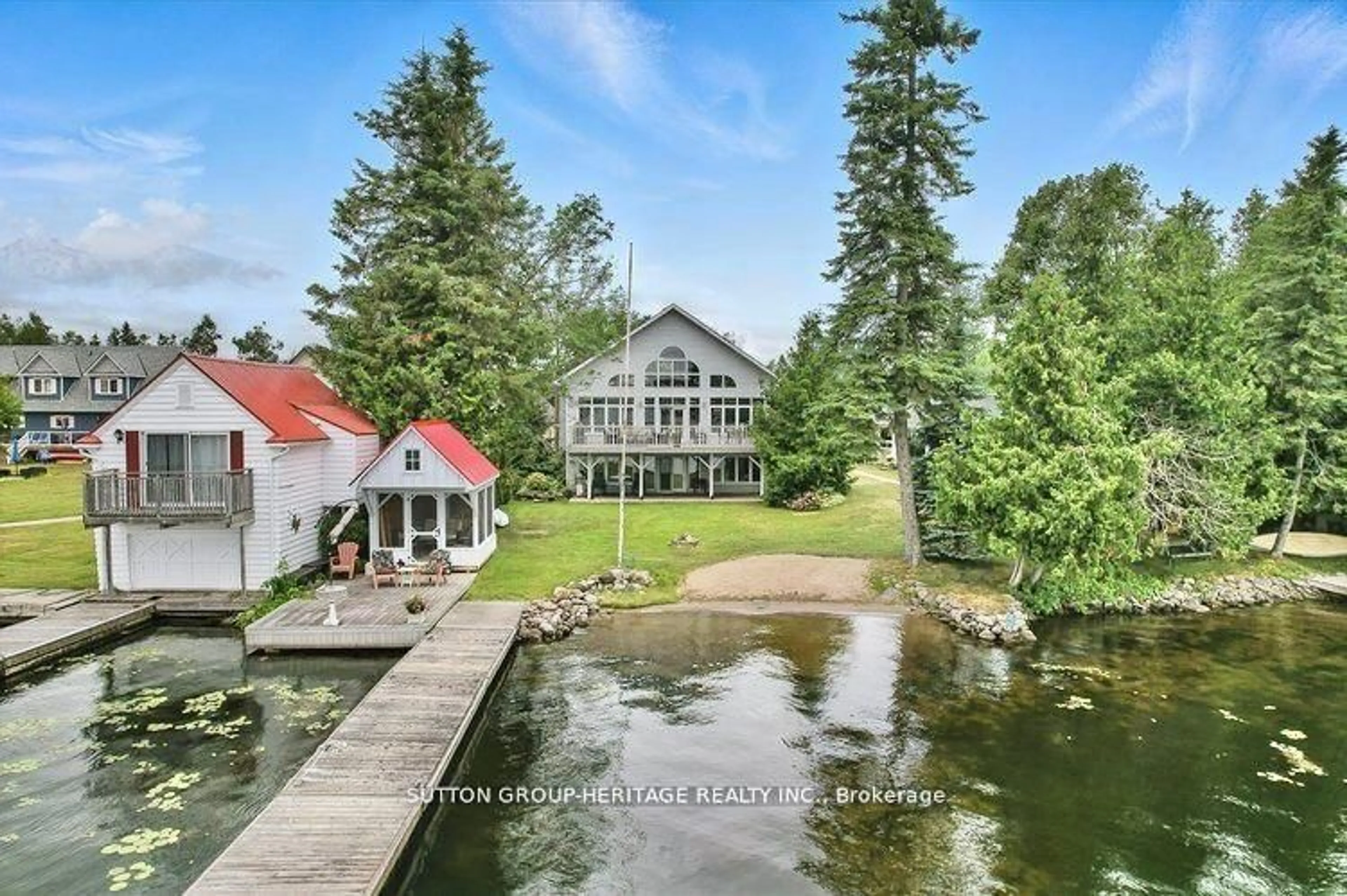 A pic from outside/outdoor area/front of a property/back of a property/a pic from drone, water/lake/river/ocean view for 400 Front St, Kawartha Lakes Ontario K0M 1A0