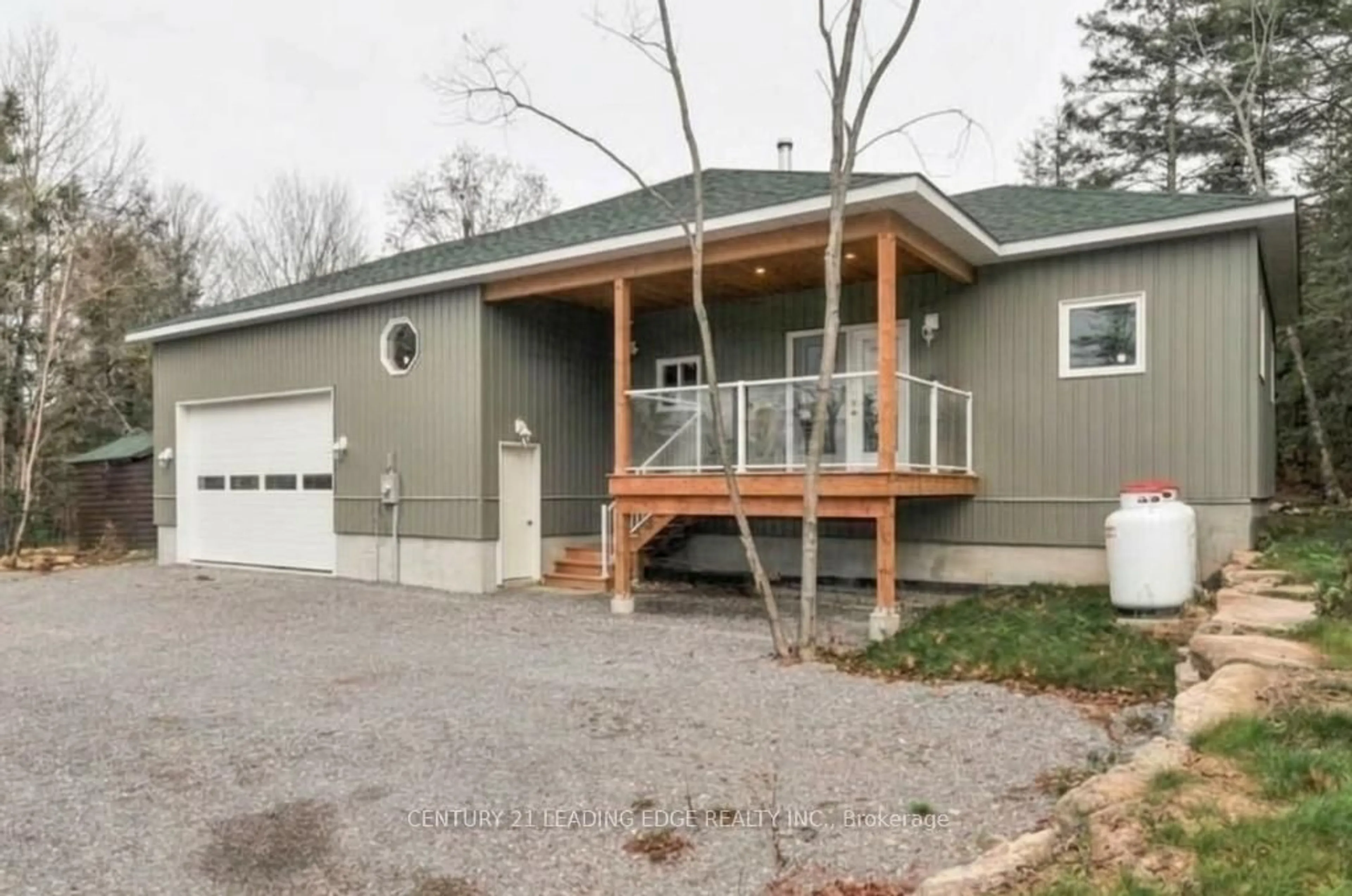 Home with vinyl exterior material, street for 29 Edwina Dr, Trent Lakes Ontario K0M 1A0