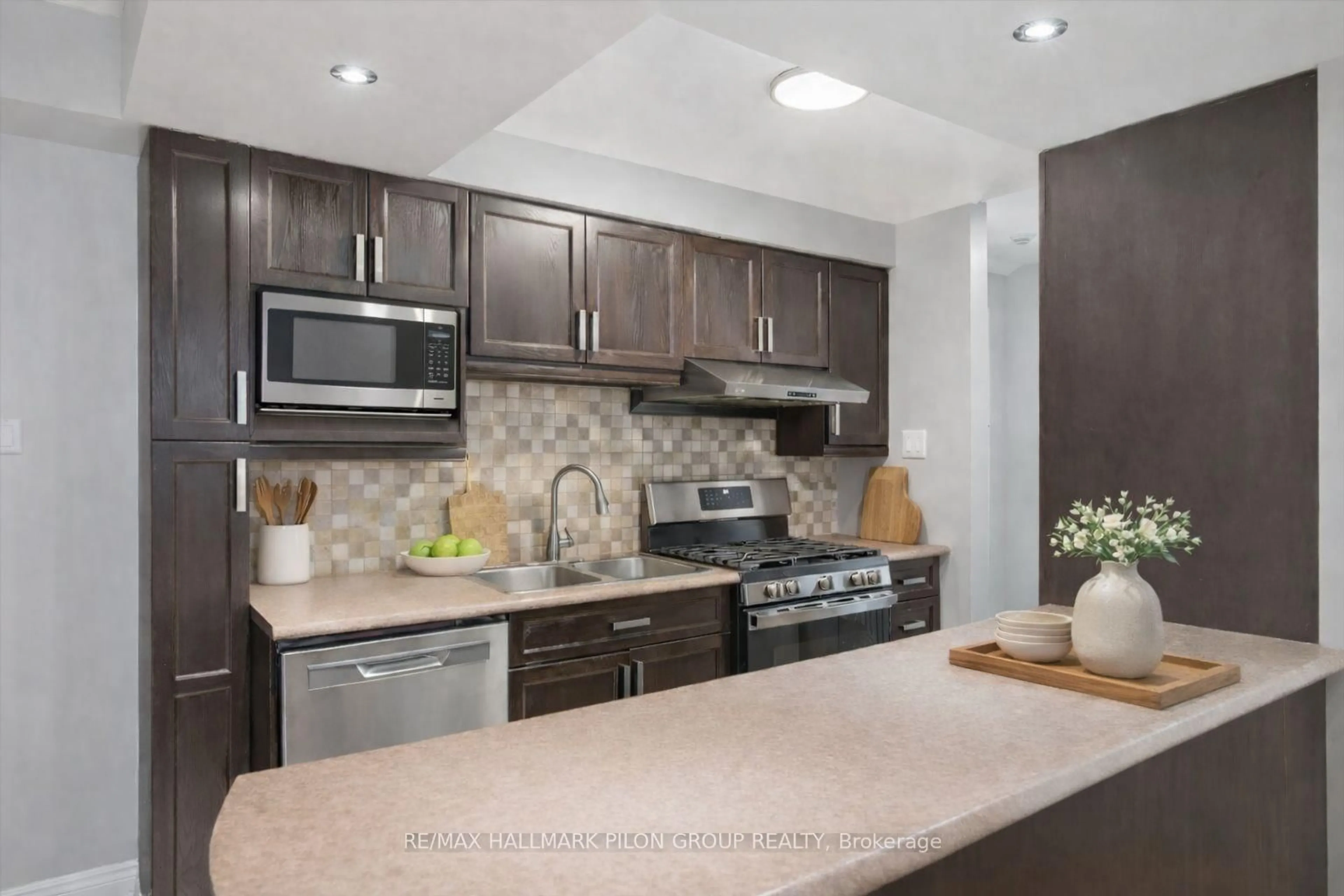 Open concept kitchen, ceramic/tile floor for 902 Notre Dame St #100, Russell Ontario K0A 1W0