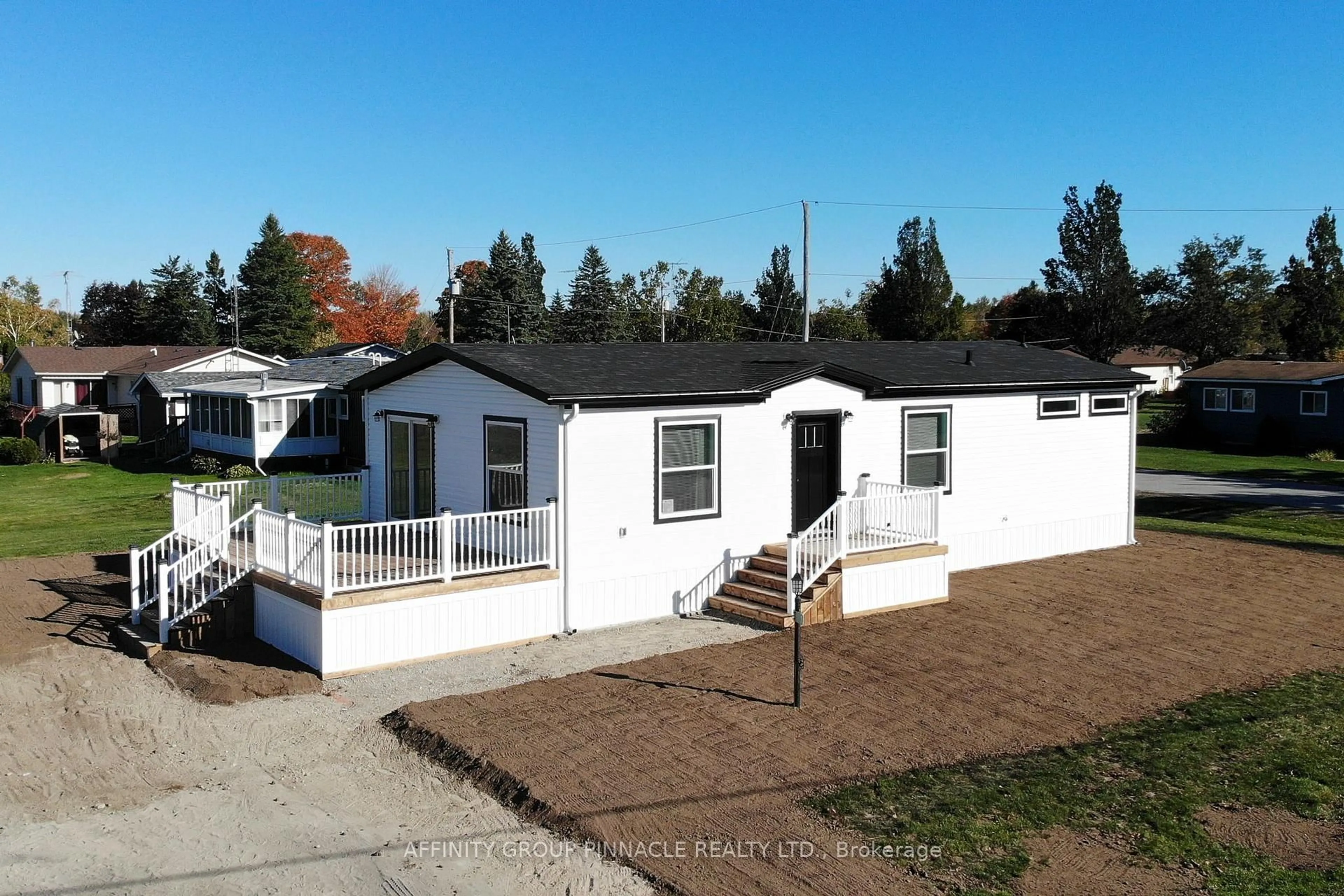 A pic from outside/outdoor area/front of a property/back of a property/a pic from drone, street for 1 Vista Dr, Kawartha Lakes Ontario K9V 0H7