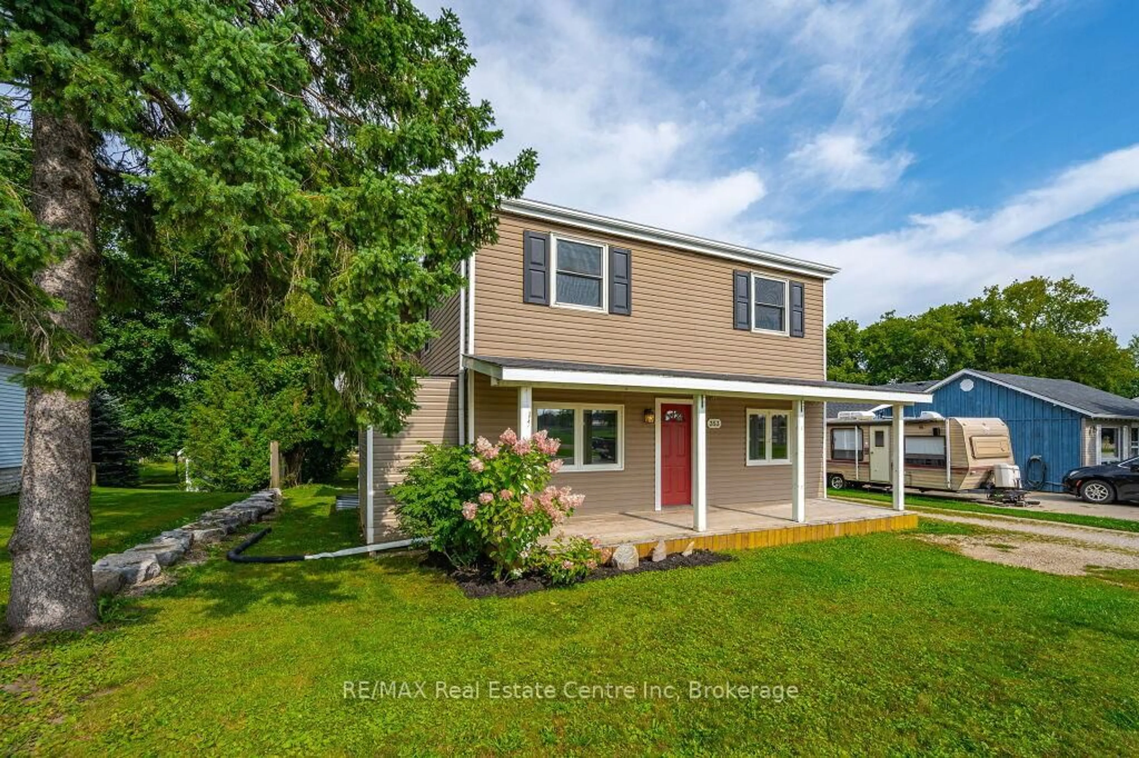 Home with vinyl exterior material, street for 353 Wellington St, Wellington North Ontario N0G 2L2