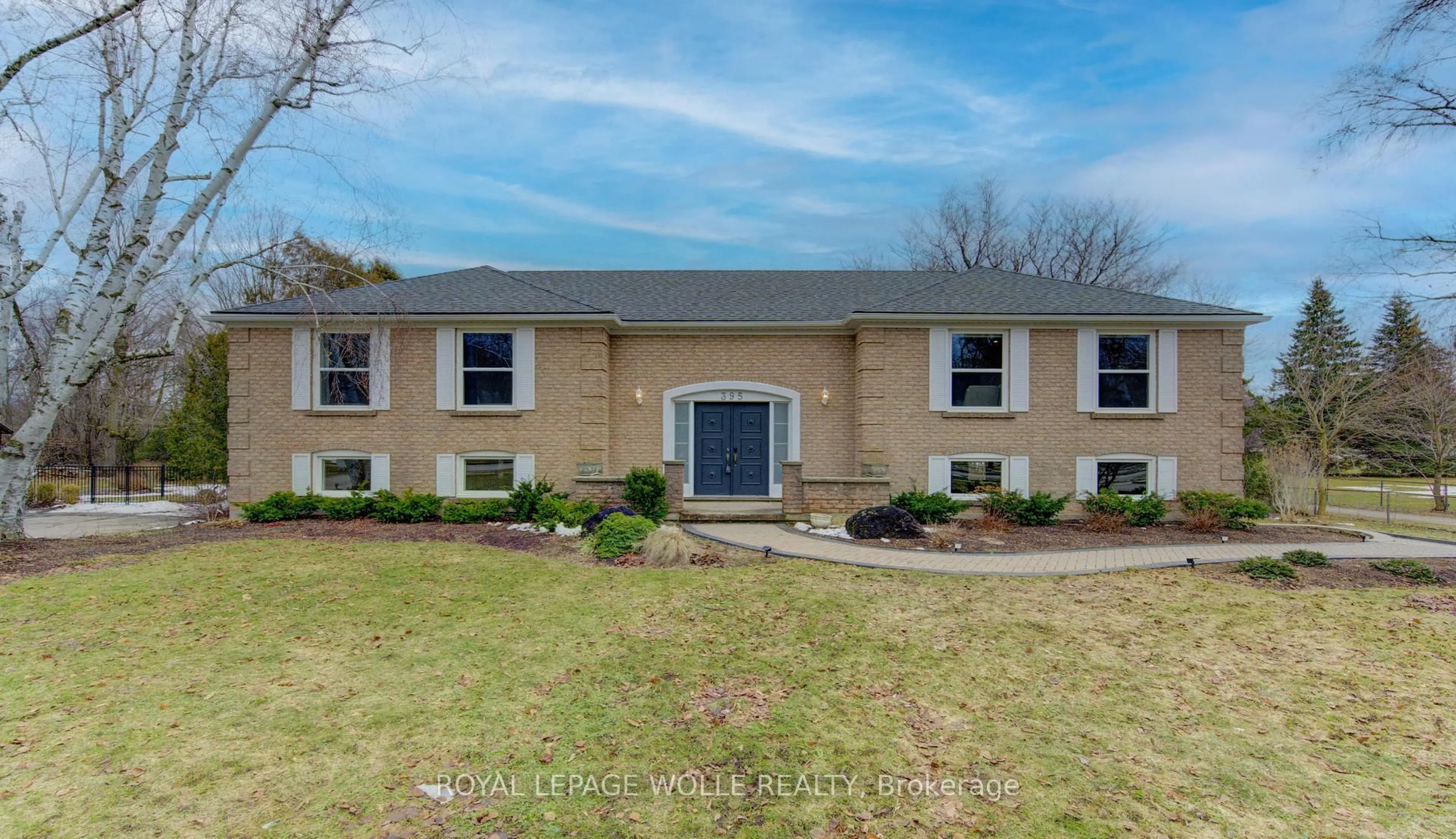 Home with brick exterior material, street for 395 Warrington Dr, Waterloo Ontario N2L 2P7