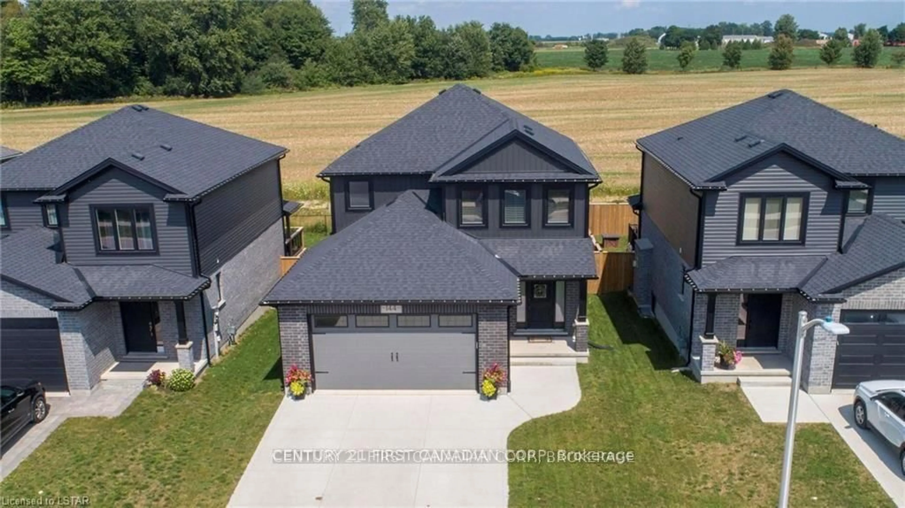 A pic from outside/outdoor area/front of a property/back of a property/a pic from drone, unknown for 144 Gilmour Dr, Lucan Biddulph Ontario N0M 2J0