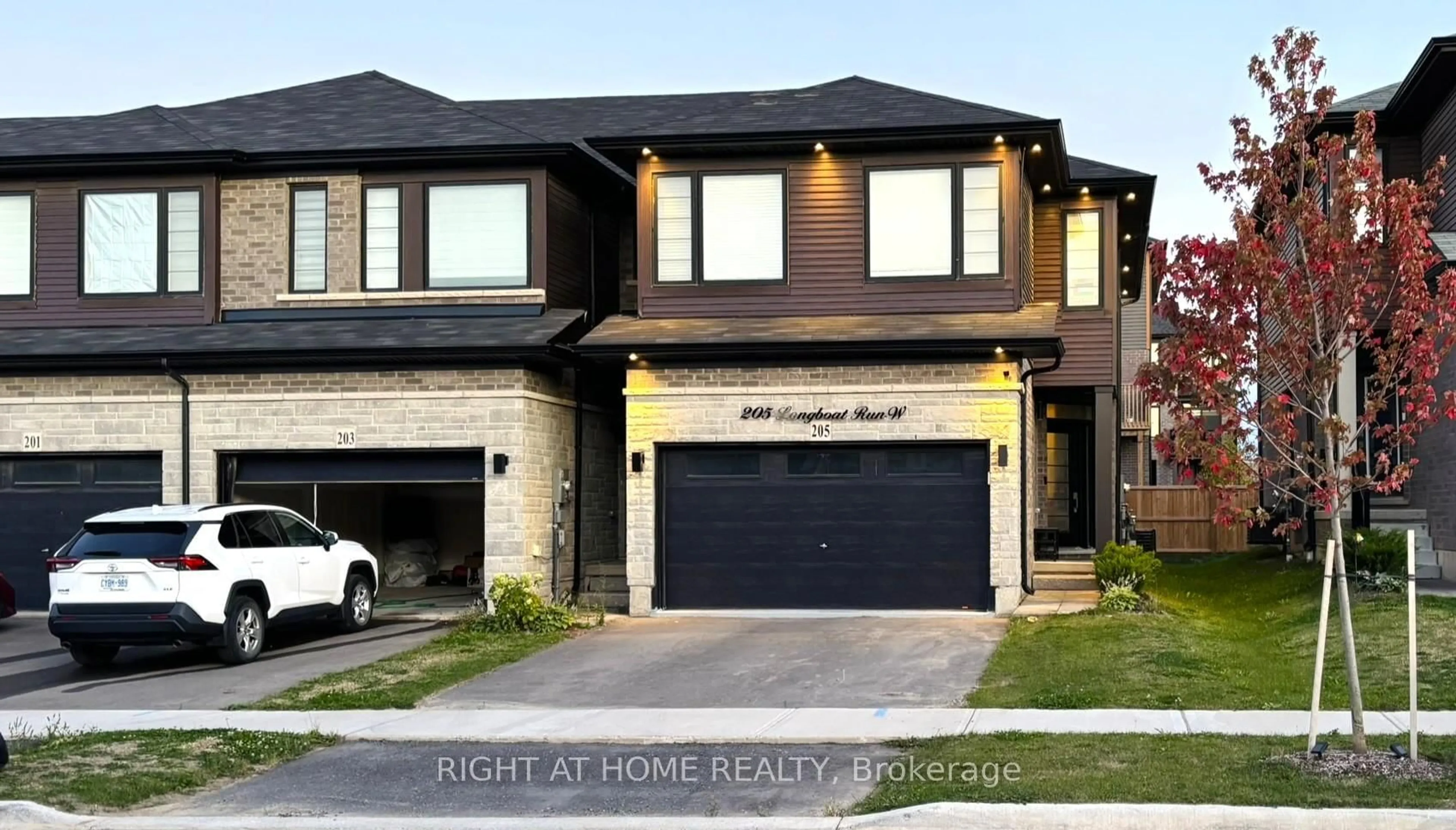 Home with brick exterior material, street for 205 Longboat Ru, Brantford Ontario N3T 0T2