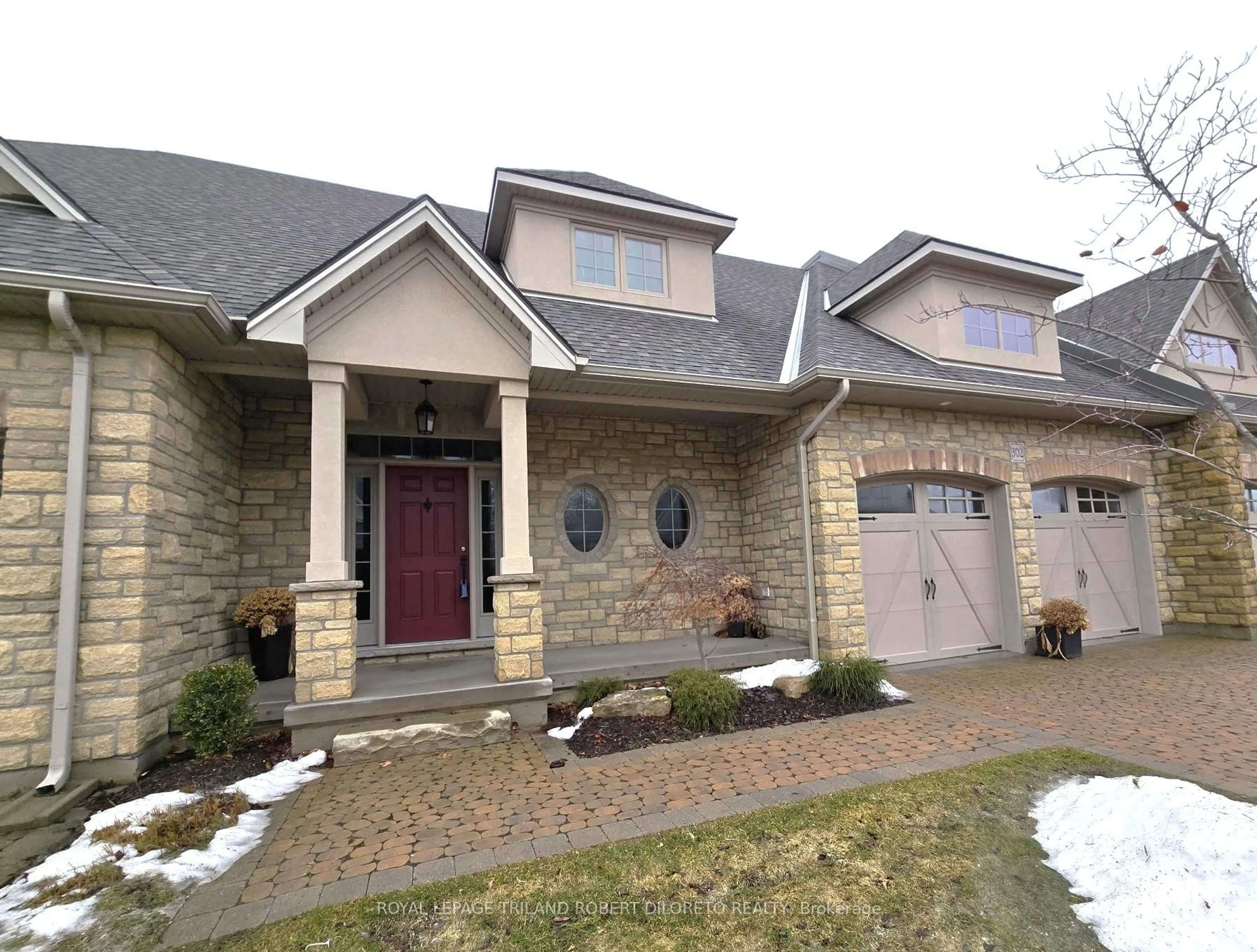 Home with brick exterior material, street for 5 Wood Haven Dr #302, Tillsonburg Ontario N4G 0A8