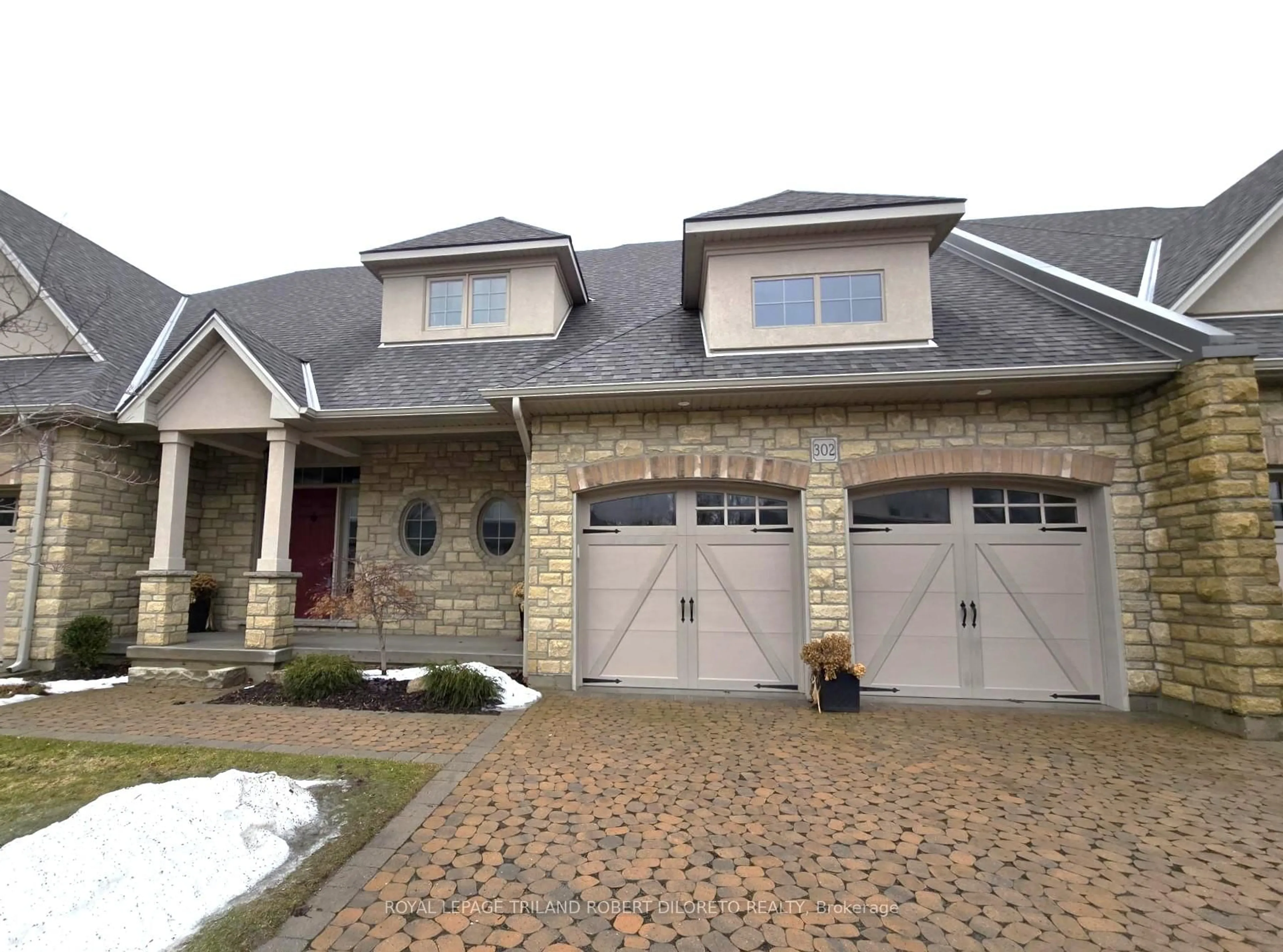 Home with brick exterior material, street for 5 Wood Haven Dr #302, Tillsonburg Ontario N4G 0A8