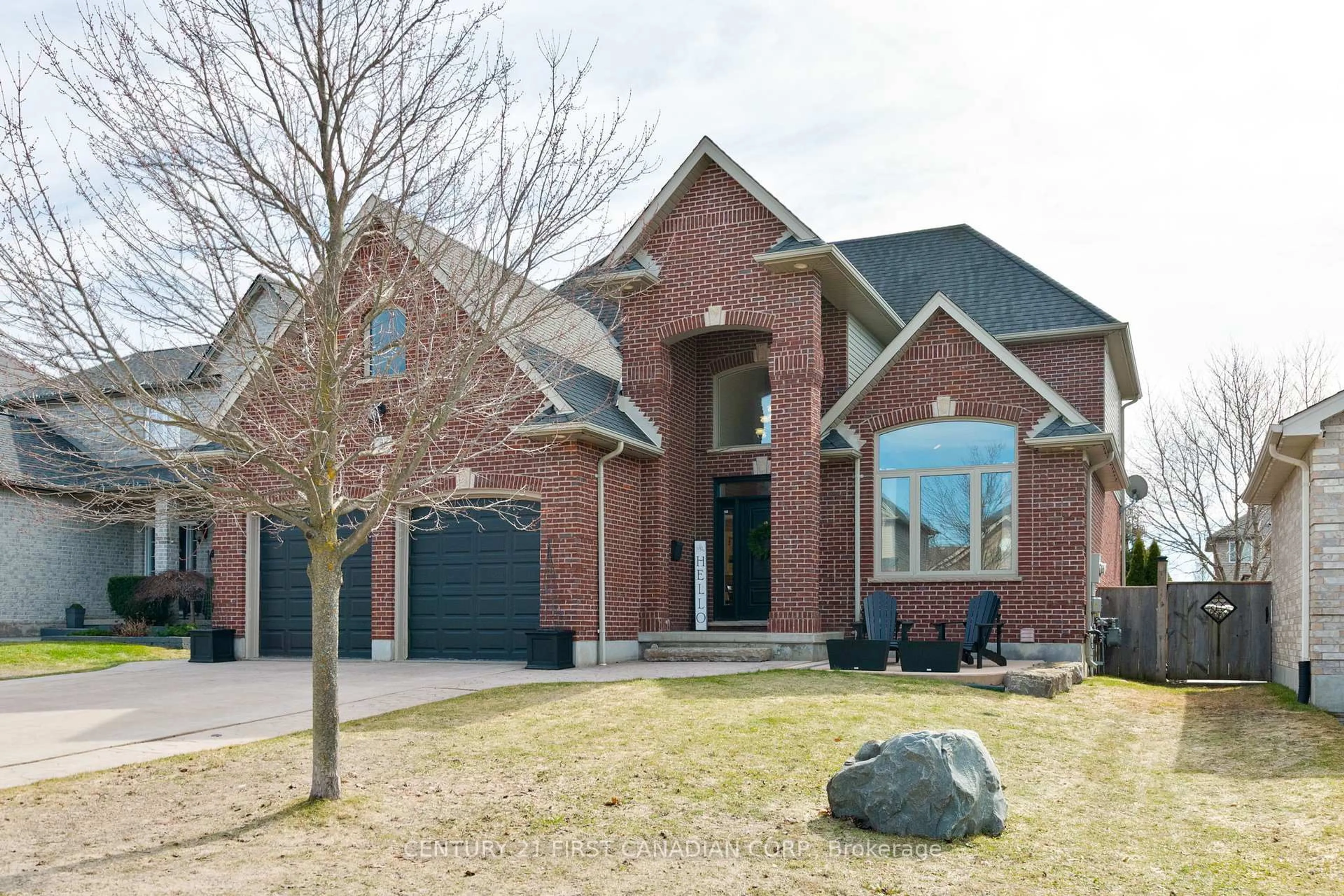 Home with brick exterior material, street for 27 Wood Lily Lane, Middlesex Centre Ontario N0M 2A0