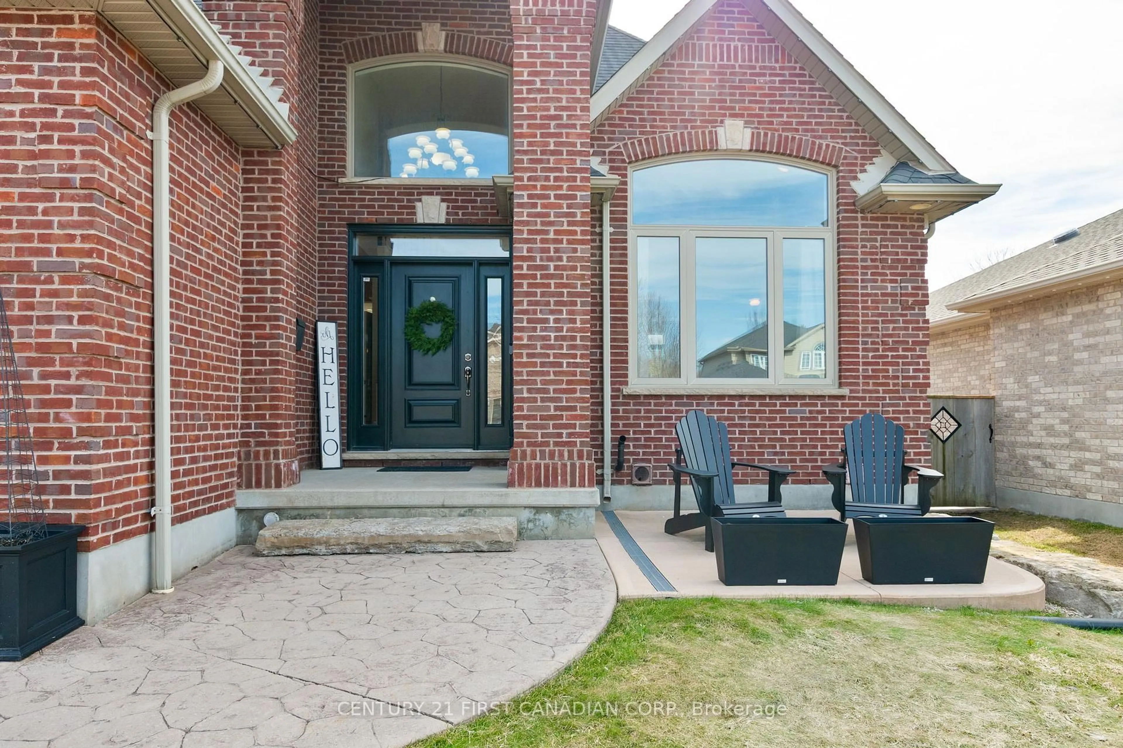 Home with brick exterior material, street for 27 Wood Lily Lane, Middlesex Centre Ontario N0M 2A0