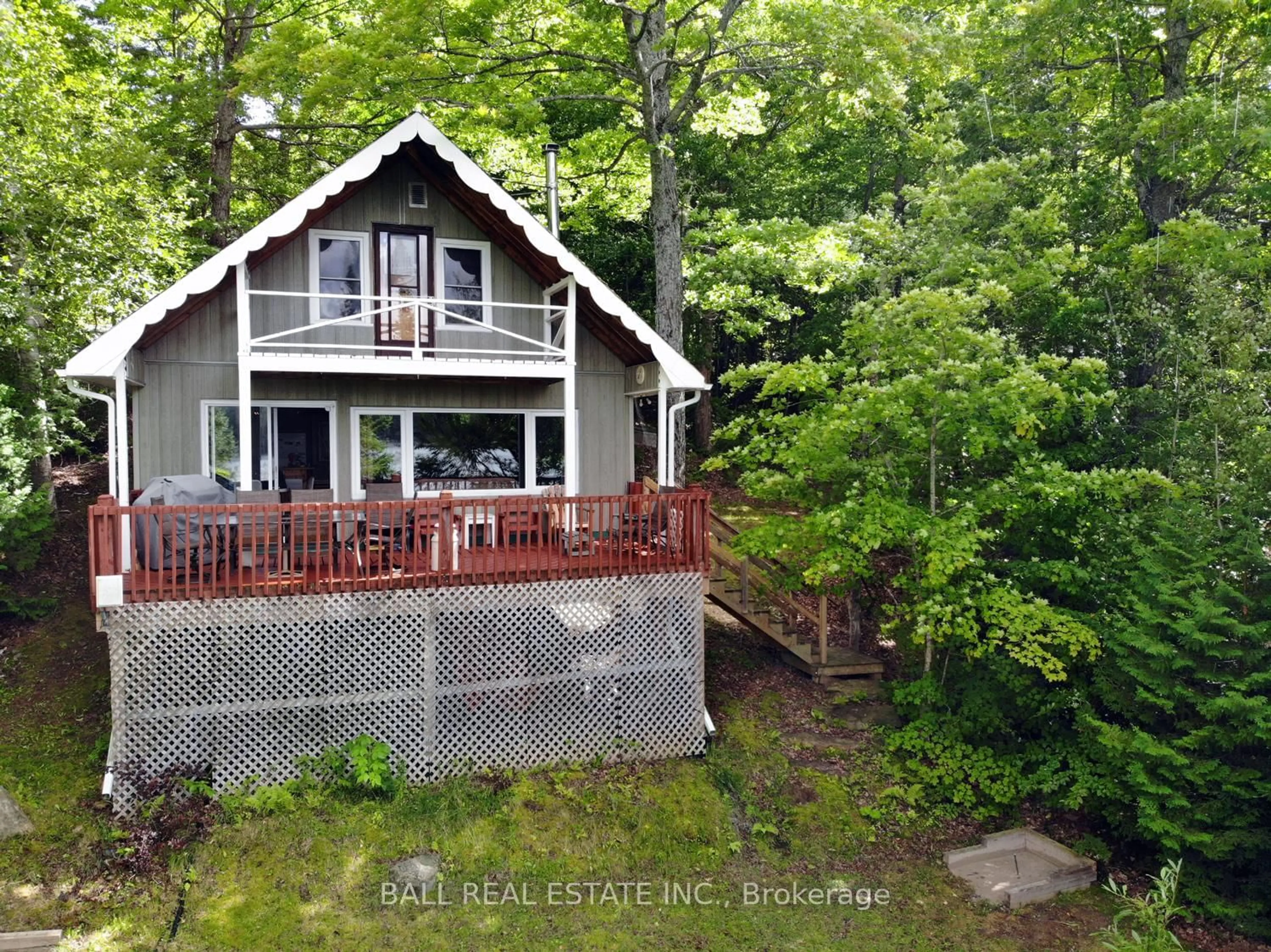 A pic from outside/outdoor area/front of a property/back of a property/a pic from drone, water/lake/river/ocean view for 277 W Diamond Lake Rd, Haliburton Ontario K0L 2A0