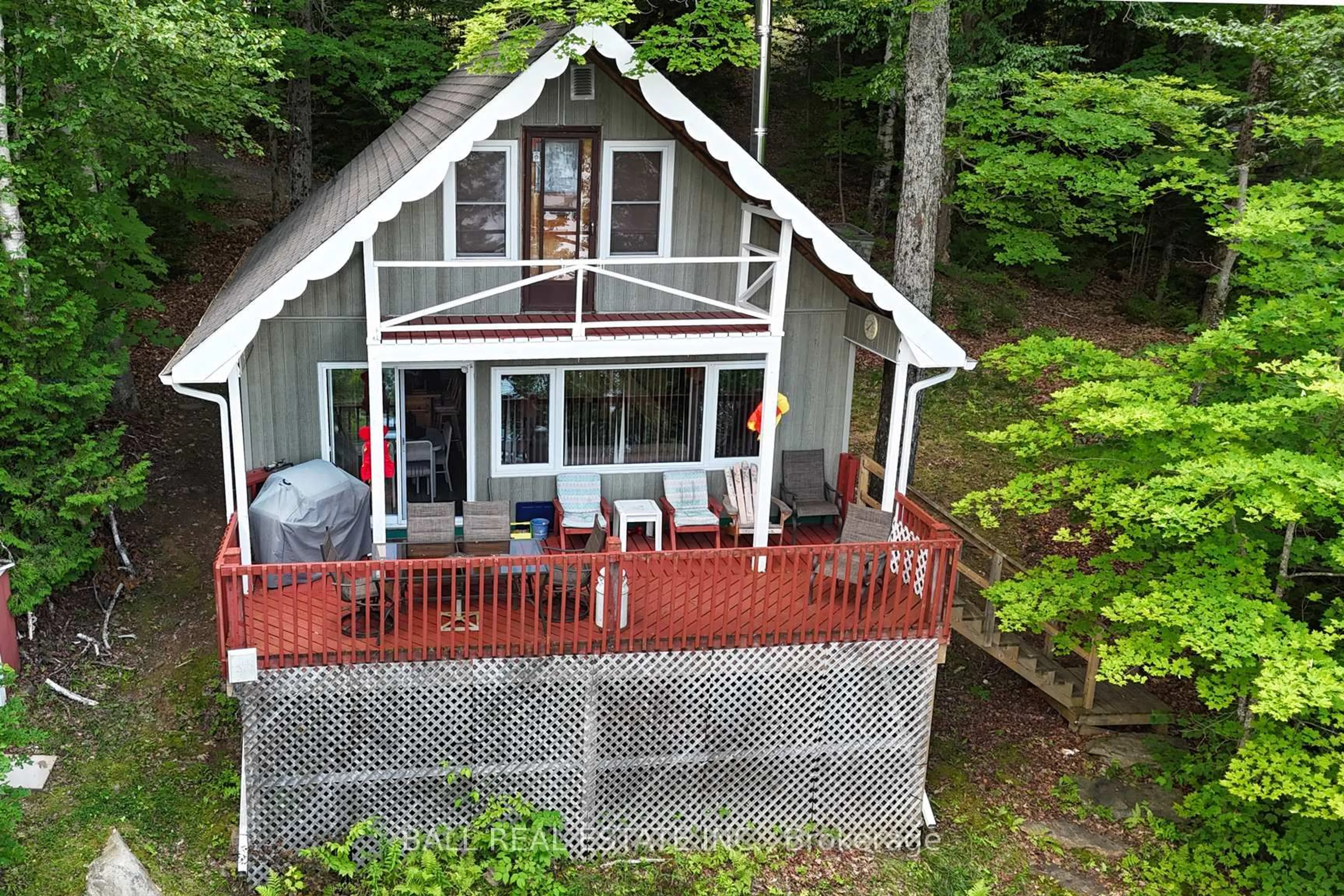 A pic from outside/outdoor area/front of a property/back of a property/a pic from drone, water/lake/river/ocean view for 277 W Diamond Lake Rd, Haliburton Ontario K0L 2A0