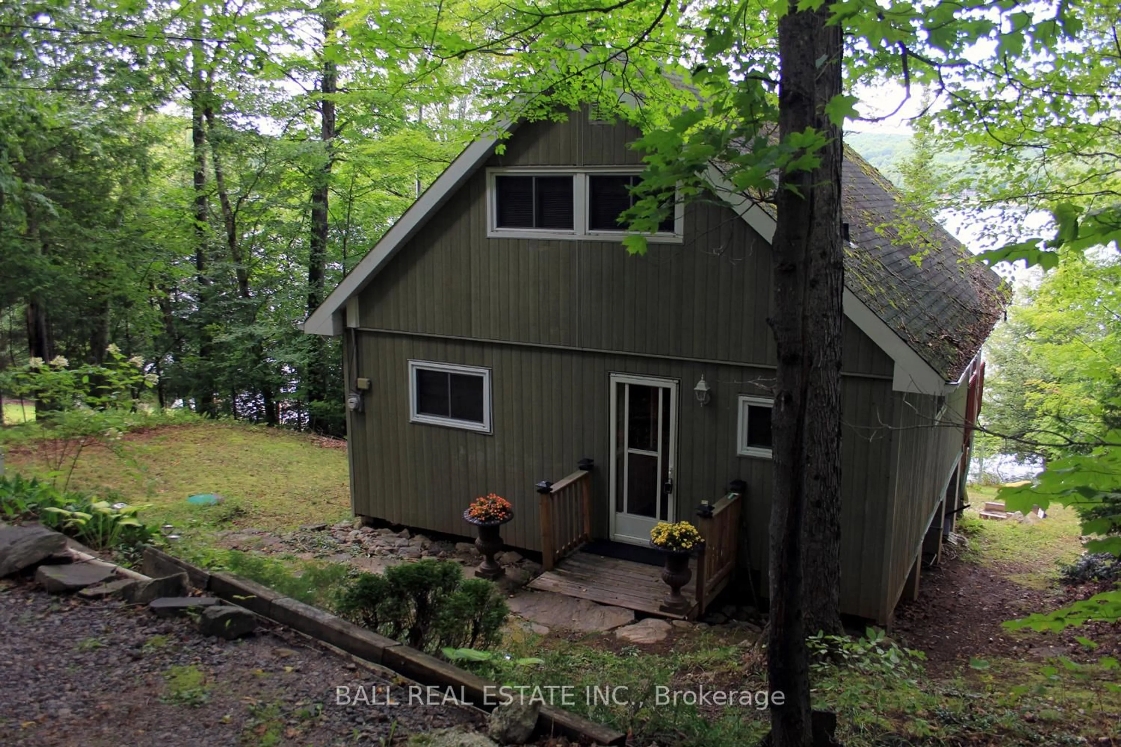 A pic from outside/outdoor area/front of a property/back of a property/a pic from drone, forest/trees view for 277 W Diamond Lake Rd, Haliburton Ontario K0L 2A0