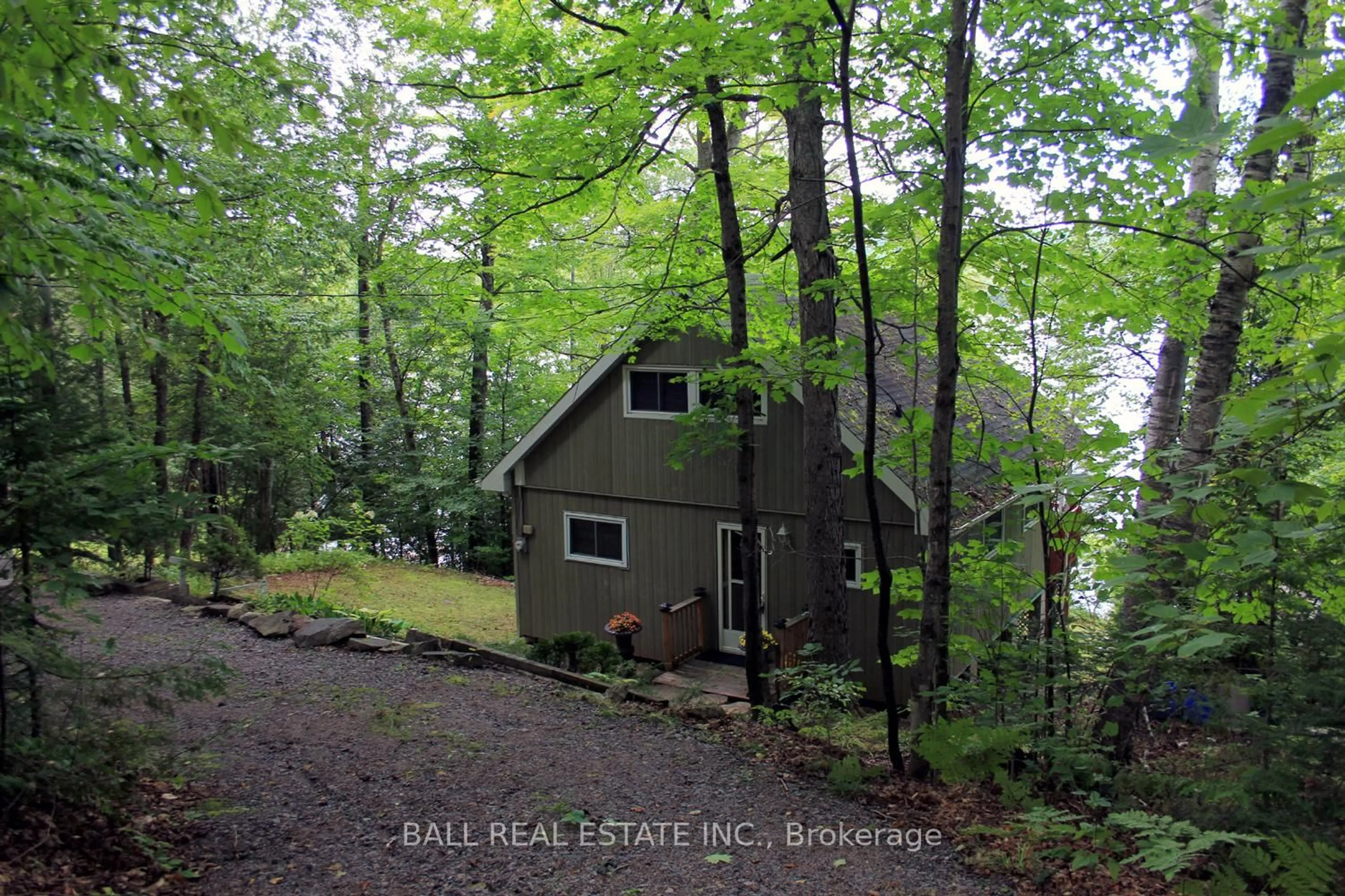 A pic from outside/outdoor area/front of a property/back of a property/a pic from drone, forest/trees view for 277 W Diamond Lake Rd, Haliburton Ontario K0L 2A0