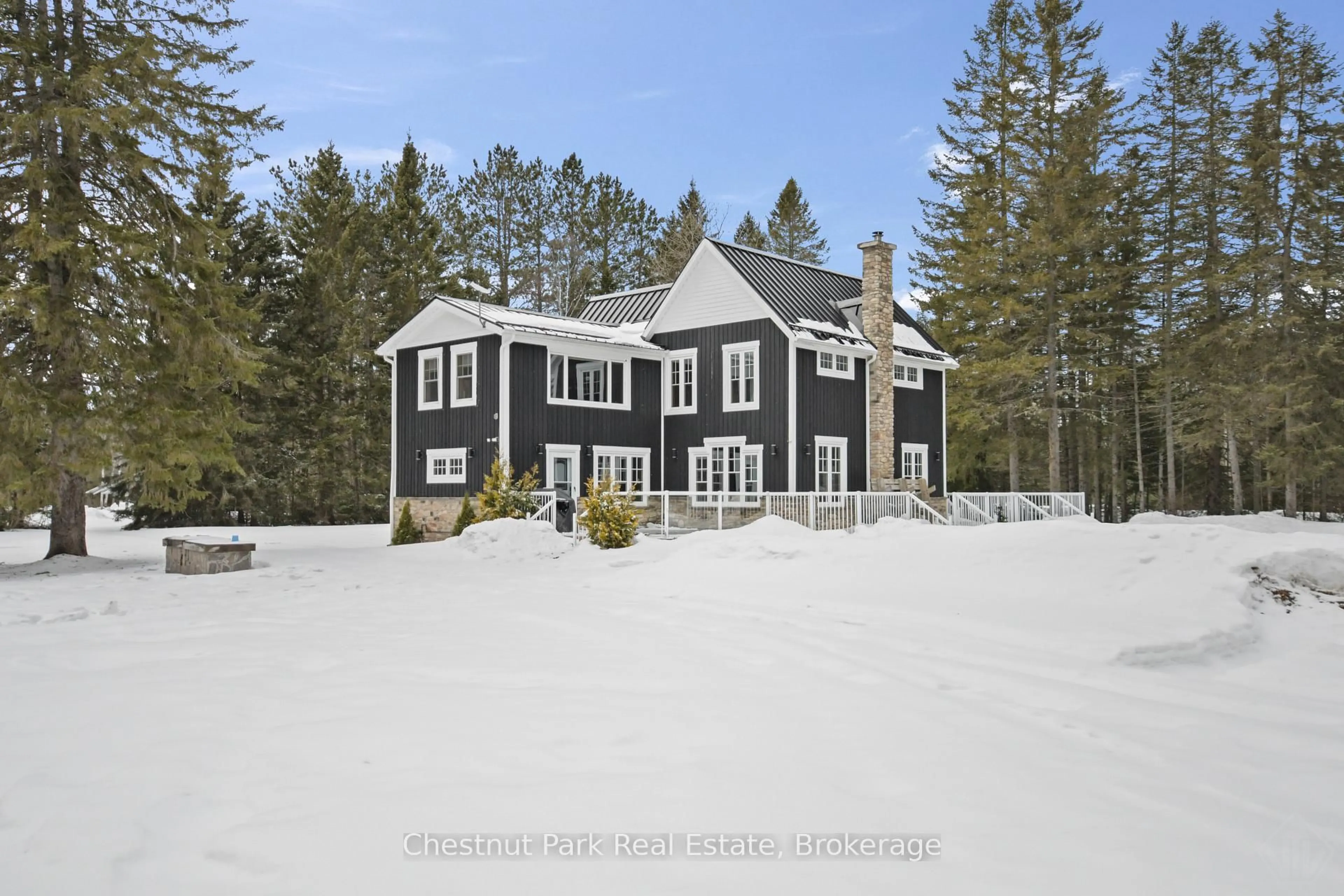 A pic from outside/outdoor area/front of a property/back of a property/a pic from drone, unknown for 12 Emsdale Lake Rd, Perry Ontario P0A 1M0