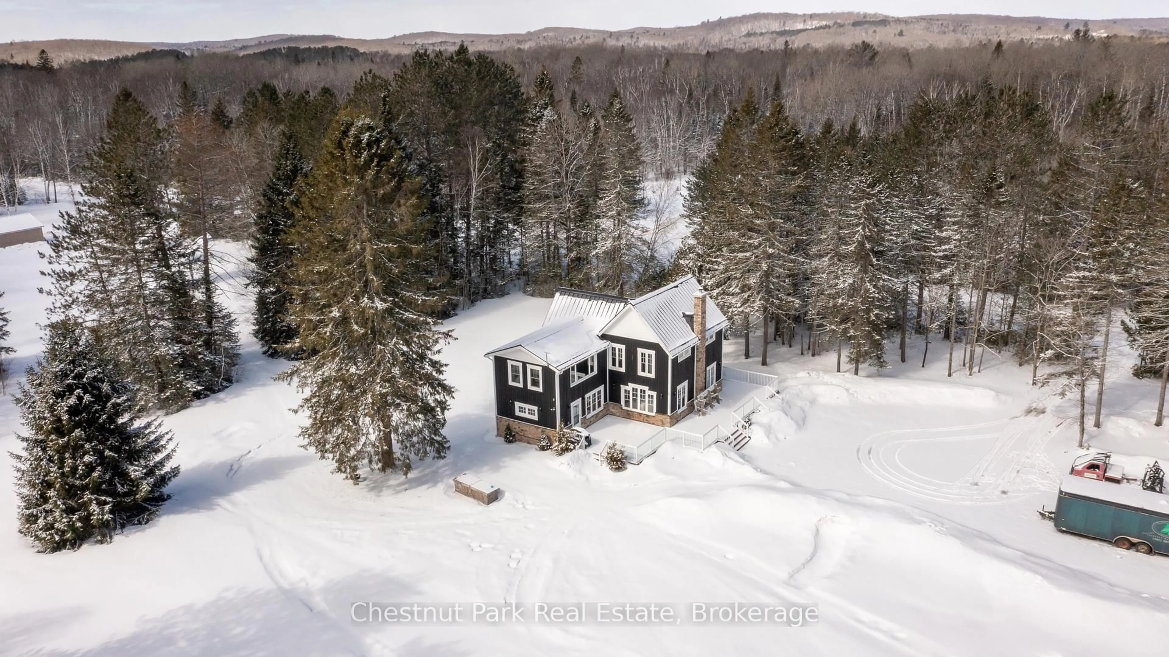 A pic from outside/outdoor area/front of a property/back of a property/a pic from drone, unknown for 12 Emsdale Lake Rd, Perry Ontario P0A 1M0
